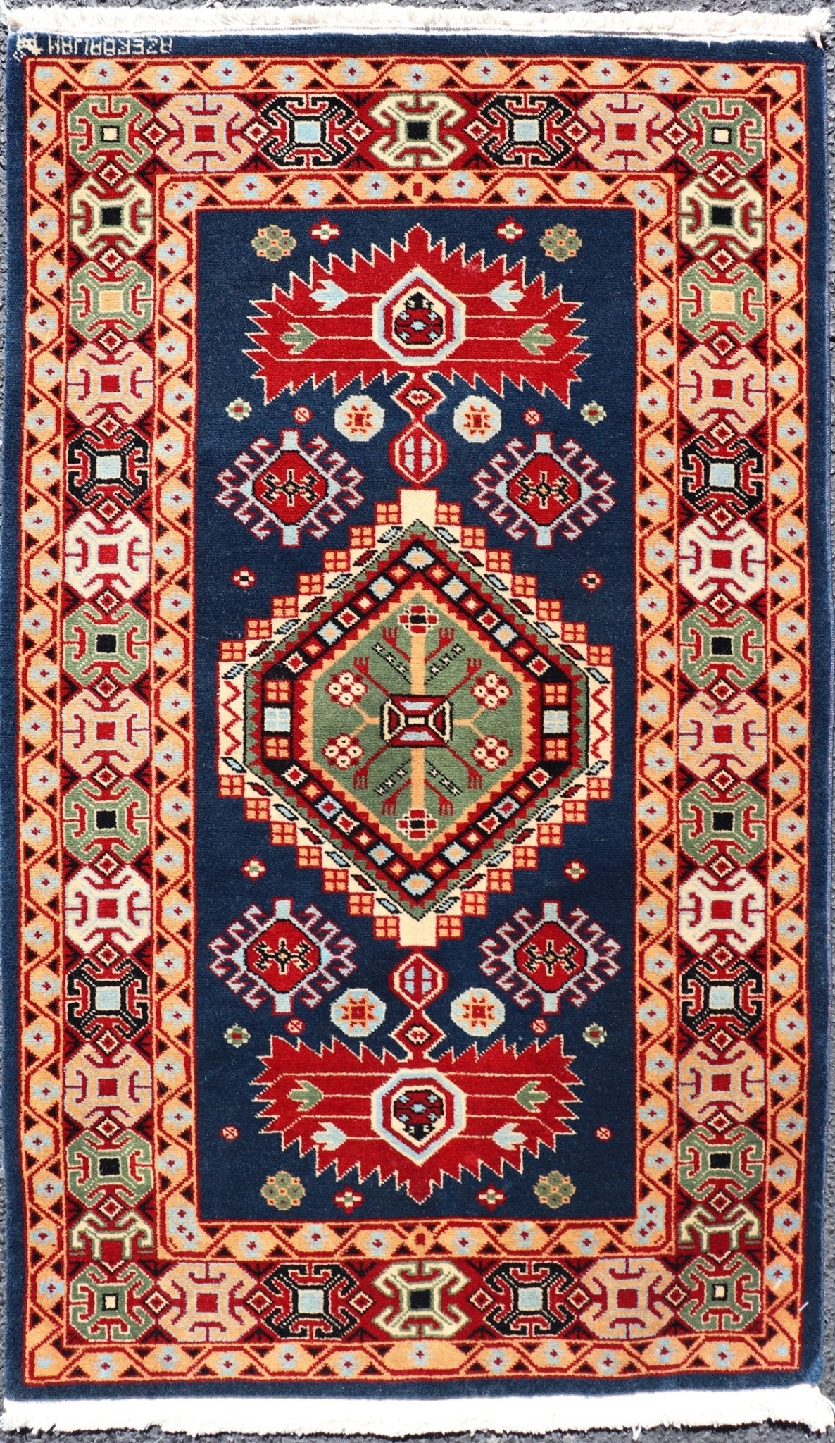 Tribal geometric medallion design vintage rug from Caucasus in multi - colors, Keivan Woven Arts / rug 10 - KE - 311, country of origin / type: Caucasus / Tribal, late 20th century Measures: 2'0 x 4'0 The vibrant reds, blues, and ivories that decorate ... - Keivan Woven Arts10 - KE - 311 - 1259Rug