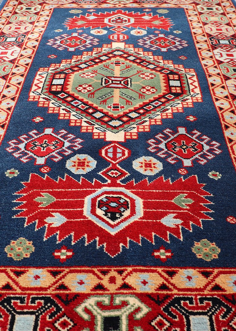 Tribal geometric medallion design vintage rug from Caucasus in multi - colors, Keivan Woven Arts / rug 10 - KE - 311, country of origin / type: Caucasus / Tribal, late 20th century Measures: 2'0 x 4'0 The vibrant reds, blues, and ivories that decorate ... - Keivan Woven Arts10 - KE - 311 - 1259Rug