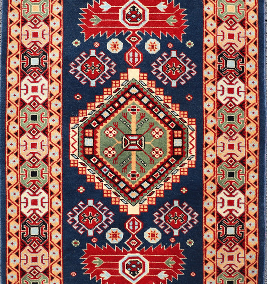 Tribal geometric medallion design vintage rug from Caucasus in multi - colors, Keivan Woven Arts / rug 10 - KE - 311, country of origin / type: Caucasus / Tribal, late 20th century Measures: 2'0 x 4'0 The vibrant reds, blues, and ivories that decorate ... - Keivan Woven Arts10 - KE - 311 - 1259