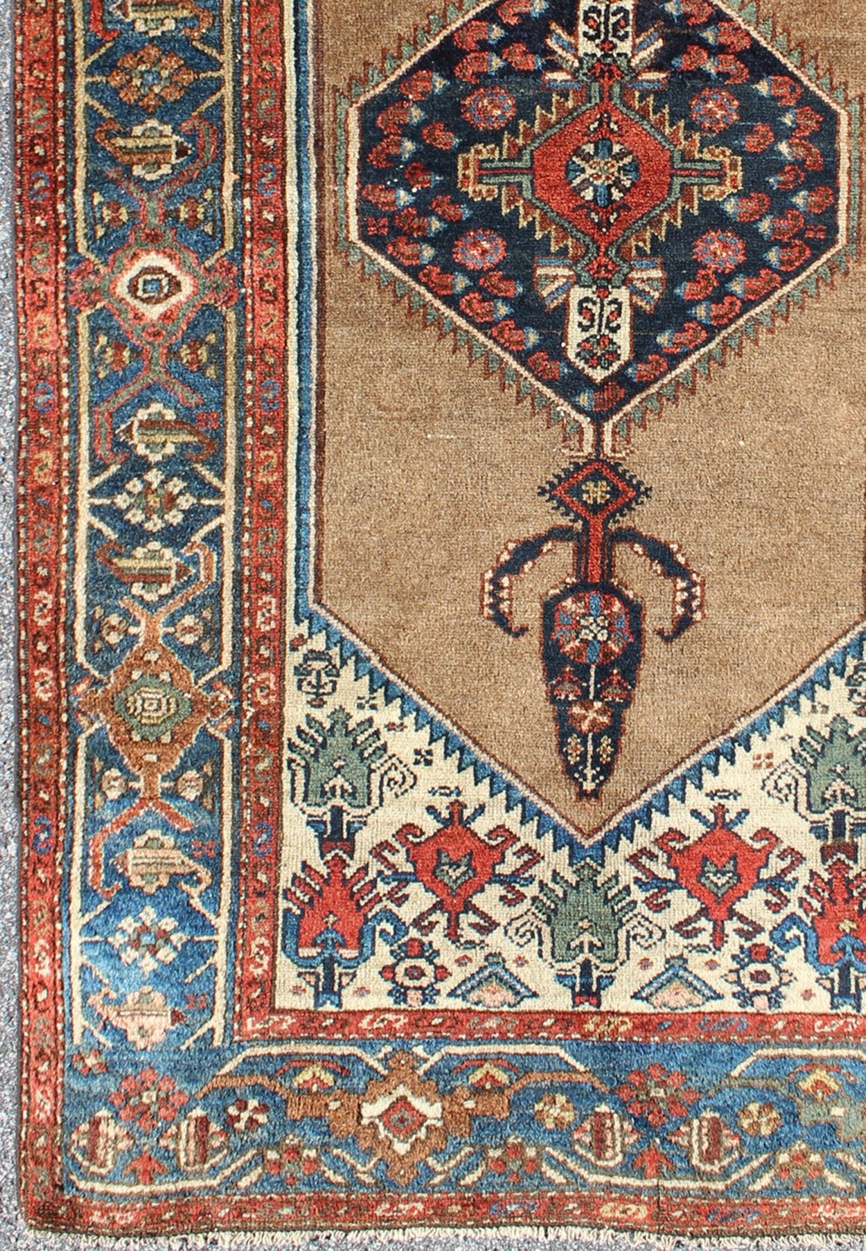Antique Persian Serab rug with stretched tribal medallion in camel, blue, ivory and red, rug m14 - 0506, country of origin / type: Iran / Serab, circa 1900 This early 20th century, handwoven antique Persian Serab rug features a camel - colored field... - Keivan Woven Arts13 - 0906 - 4790Rug