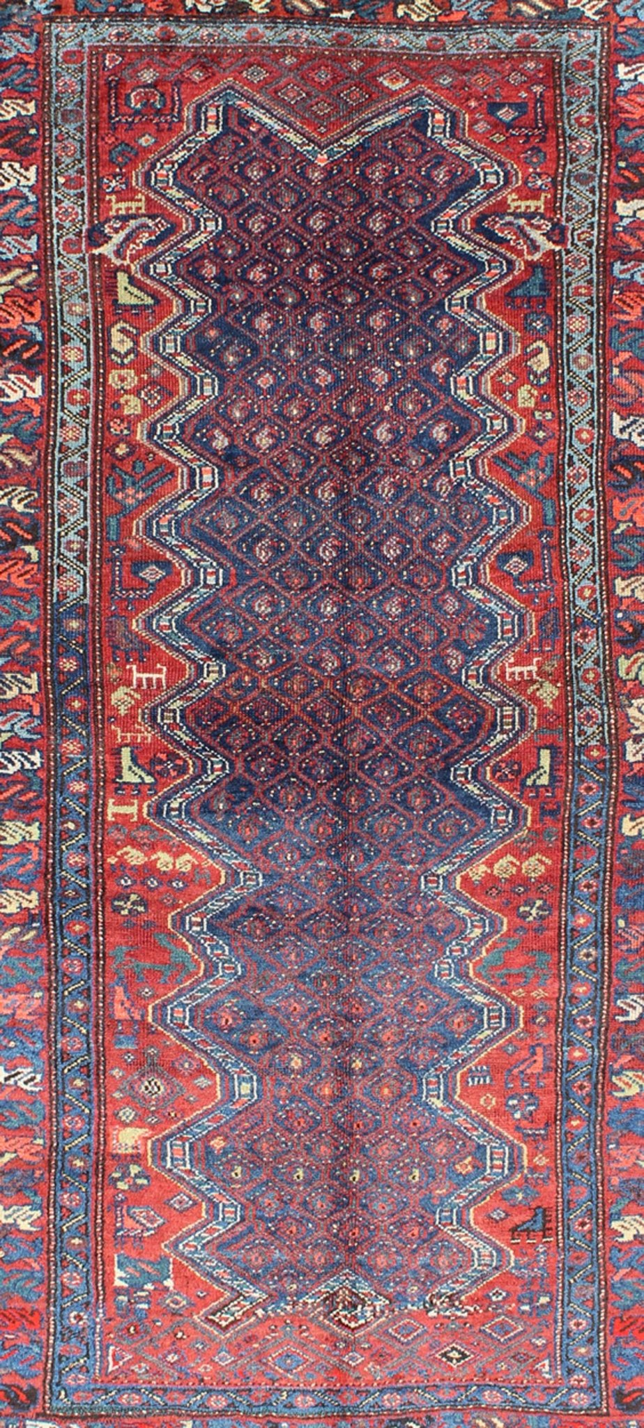 Red and Blue Antique N.W. Persian Rug with Zig - Zag Field and Tribal Motifs, rug 13 - 0913, country of origin / type: Iran / N.W. Persian, circa 1900 This antique early - 20th century Northwest Persian runner features a deep blue background with zig - ... - Keivan Woven Arts13 - 0913 - 4802Rug