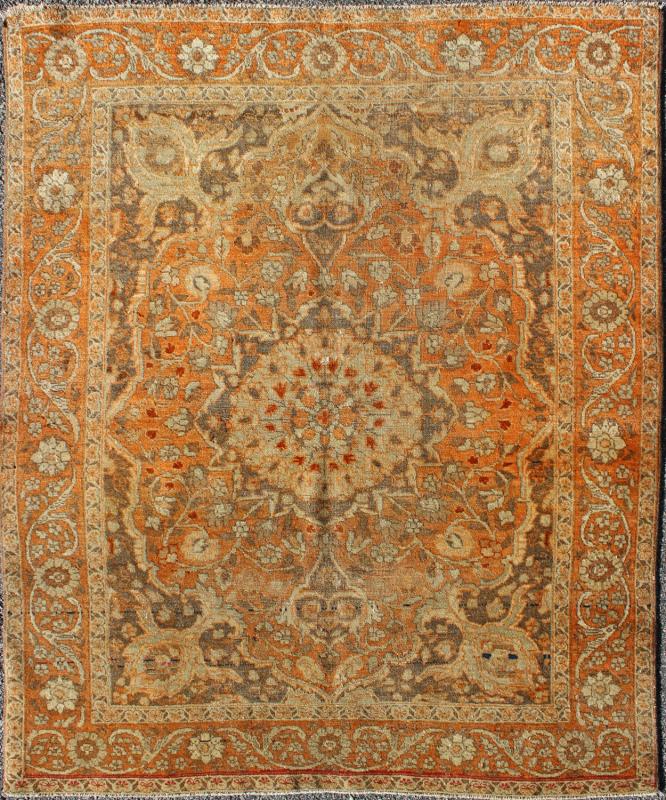 Antique Persian Tabriz Haji Jalili with Ornate Central Medallion and Florals in Orange, Brown Antique Persian Tabriz Haji Jalili with in Light Orange and light brown This magnificent antique Persian Tabriz carpet from late 19th century I... - Keivan Woven Arts16 - 1001 - 8131Rug