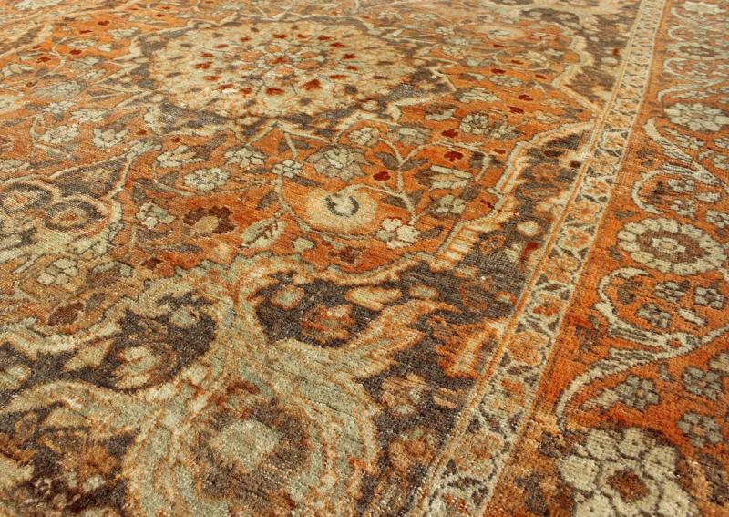 Antique Persian Tabriz Haji Jalili with Ornate Central Medallion and Florals in Orange, Brown Antique Persian Tabriz Haji Jalili with in Light Orange and light brown This magnificent antique Persian Tabriz carpet from late 19th century I... - Keivan Woven Arts16 - 1001 - 8131Rug