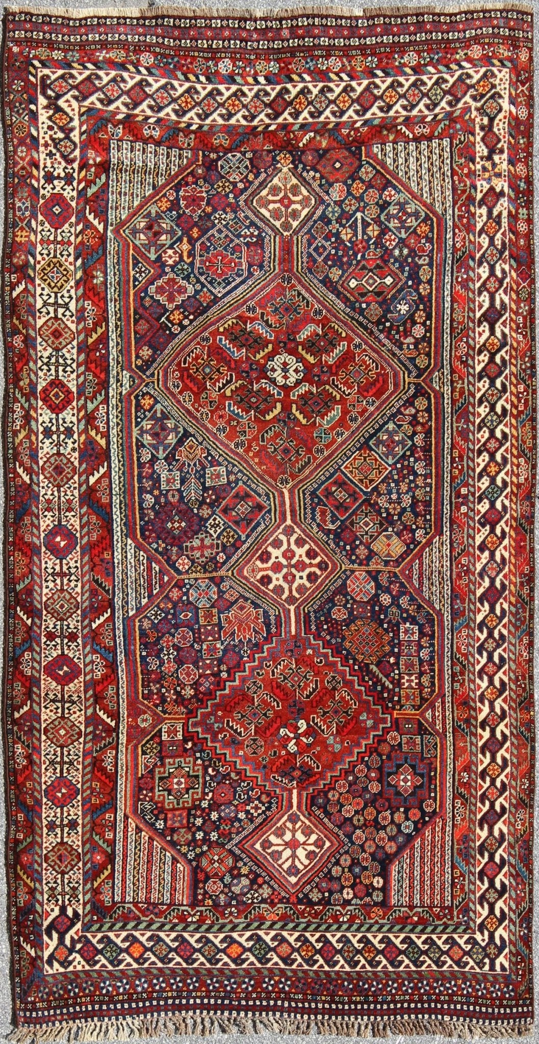 Antique Persian Qashqai Shiraz Tribal Rug with Hooked Diamond Design, rug 17 - 0305, country of origin / type: Iran / Qashqai, circa 1900. The Qashgai nomads are found in the Fars province in southwest Iran. They move twice a year, between the winter pas... - Keivan Woven Arts17 - 0305 - 8459Rug