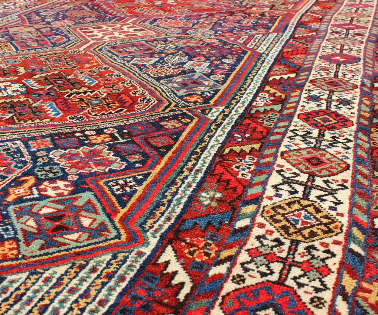 Antique Persian Qashqai Shiraz Tribal Rug with Hooked Diamond Design, rug 17 - 0305, country of origin / type: Iran / Qashqai, circa 1900. The Qashgai nomads are found in the Fars province in southwest Iran. They move twice a year, between the winter pas... - Keivan Woven Arts17 - 0305 - 8459Rug