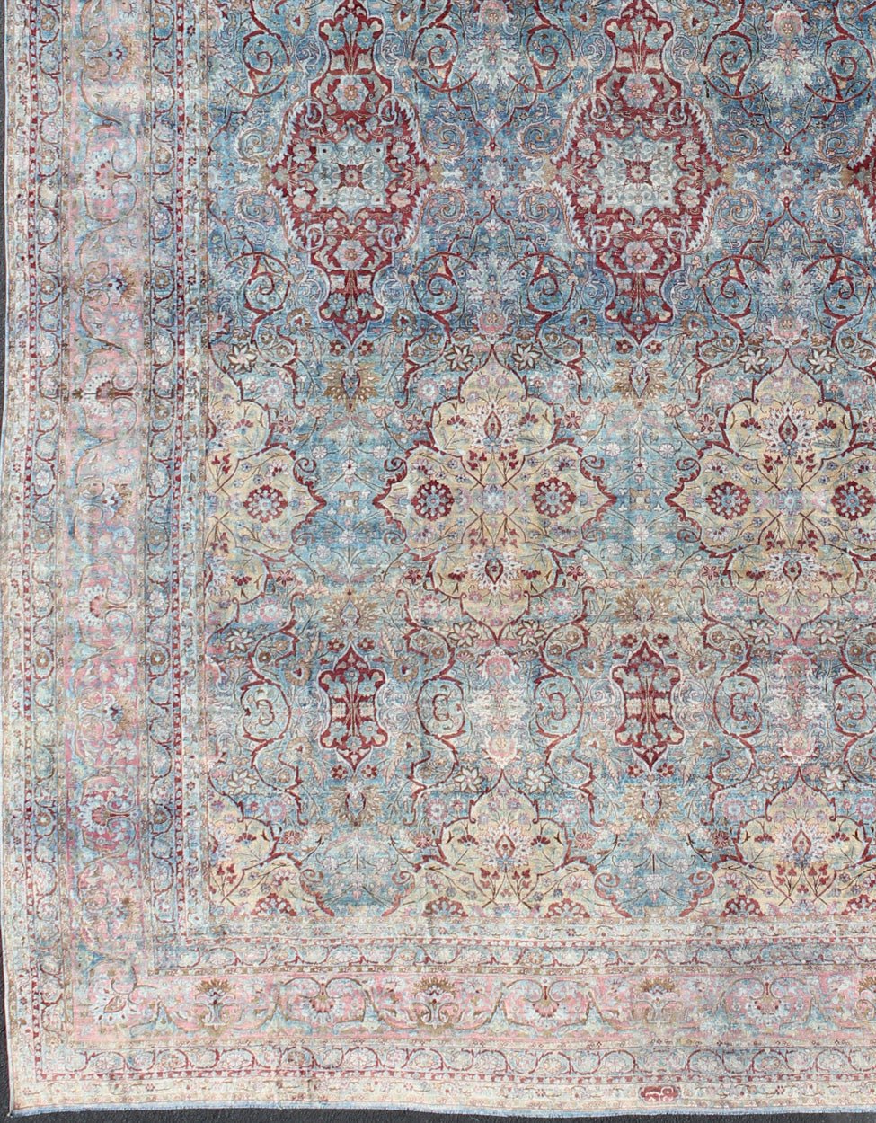 Large Antique Persian Kerman Rug with Medallions in Light Blue, Red and Pink. Large antique Persian Kerman rug with vertical medallions in light blue, red and pink. Keivan Woven Arts / rug 18 - 0201, country of origin / type: Iran / Kerman, circa 1900 ... - Keivan Woven Arts18 - 0201 - 9550Rug
