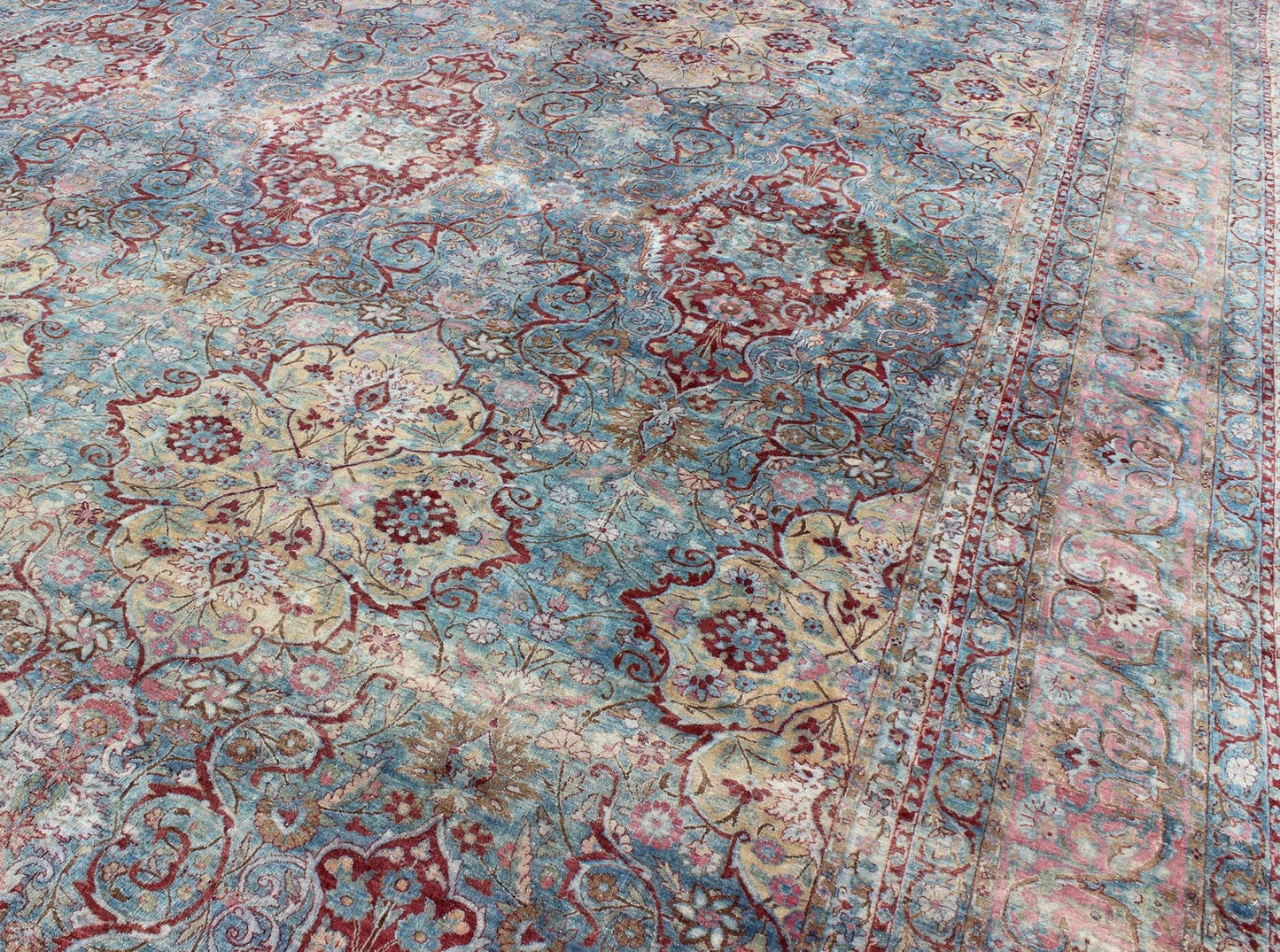 Large Antique Persian Kerman Rug with Medallions in Light Blue, Red and Pink. Large antique Persian Kerman rug with vertical medallions in light blue, red and pink. Keivan Woven Arts / rug 18 - 0201, country of origin / type: Iran / Kerman, circa 1900 ... - Keivan Woven Arts18 - 0201 - 9550Rug