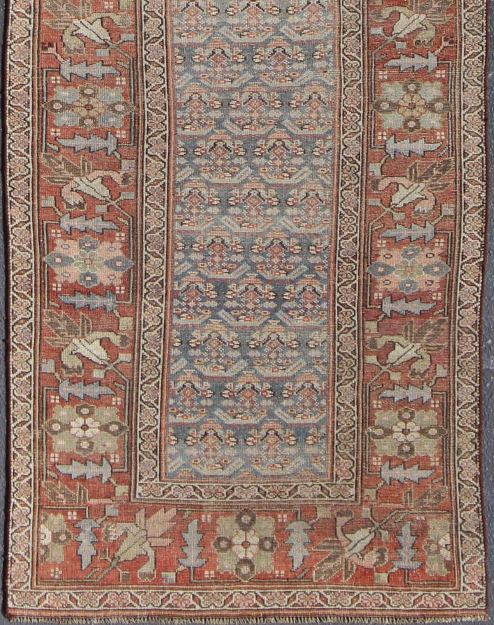 Gray background and soft red - colored Persian Kurdish antique runner in Tribal design with geometric motifs, rug 19 - 0105, country of origin / type: Iran / Kurdish, circa 1900. This antique Kurdish tribal rug was woven by Kurdish weavers in wester... - Keivan Woven Arts19 - 0105 - 11106Rug