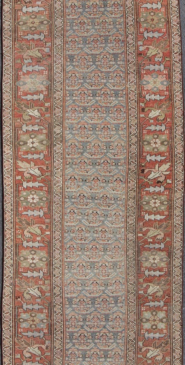 Gray background and soft red - colored Persian Kurdish antique runner in Tribal design with geometric motifs, rug 19 - 0105, country of origin / type: Iran / Kurdish, circa 1900. This antique Kurdish tribal rug was woven by Kurdish weavers in wester... - Keivan Woven Arts19 - 0105 - 11106Rug