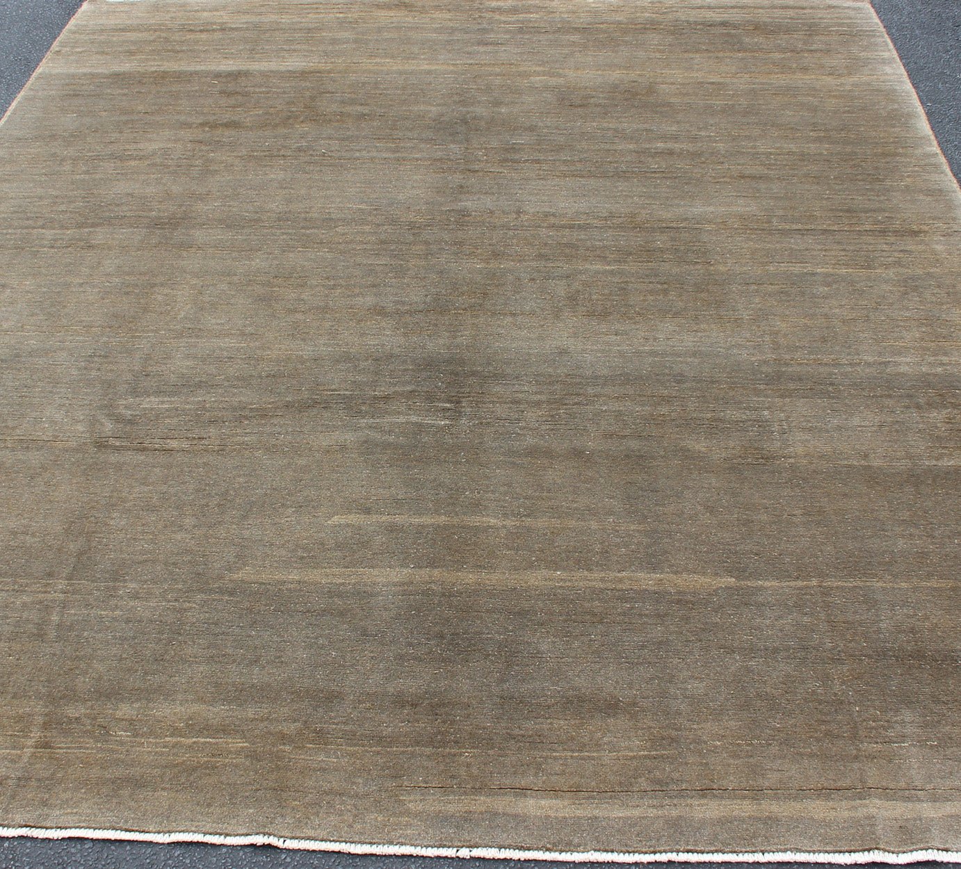 Modern Rug in Neutral Tones With Subdued Design by Keivan Woven Arts. Keivan Woven Arts / rug 1912 - 274, country of origin / type: Afghanistan. Measures: 8'3 x 9'10. The subdued design of this piled rug makes it perfect for modern and casual inte... - Keivan Woven Arts1912 - 274 - 12843Rug