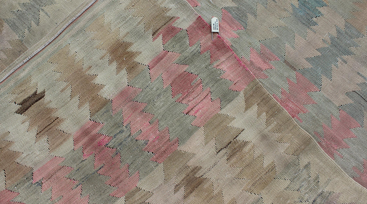 Ivory, Gray, Blue, pink and Blush Antique Turkish Kilim Flat-Weave Runner
Geometric all over design design flat-weave Kilim runner from Turkey in neutral, muted colors, rug/EN-165685, country of origin / type: Turkey / Kilim, circa 1950
F...