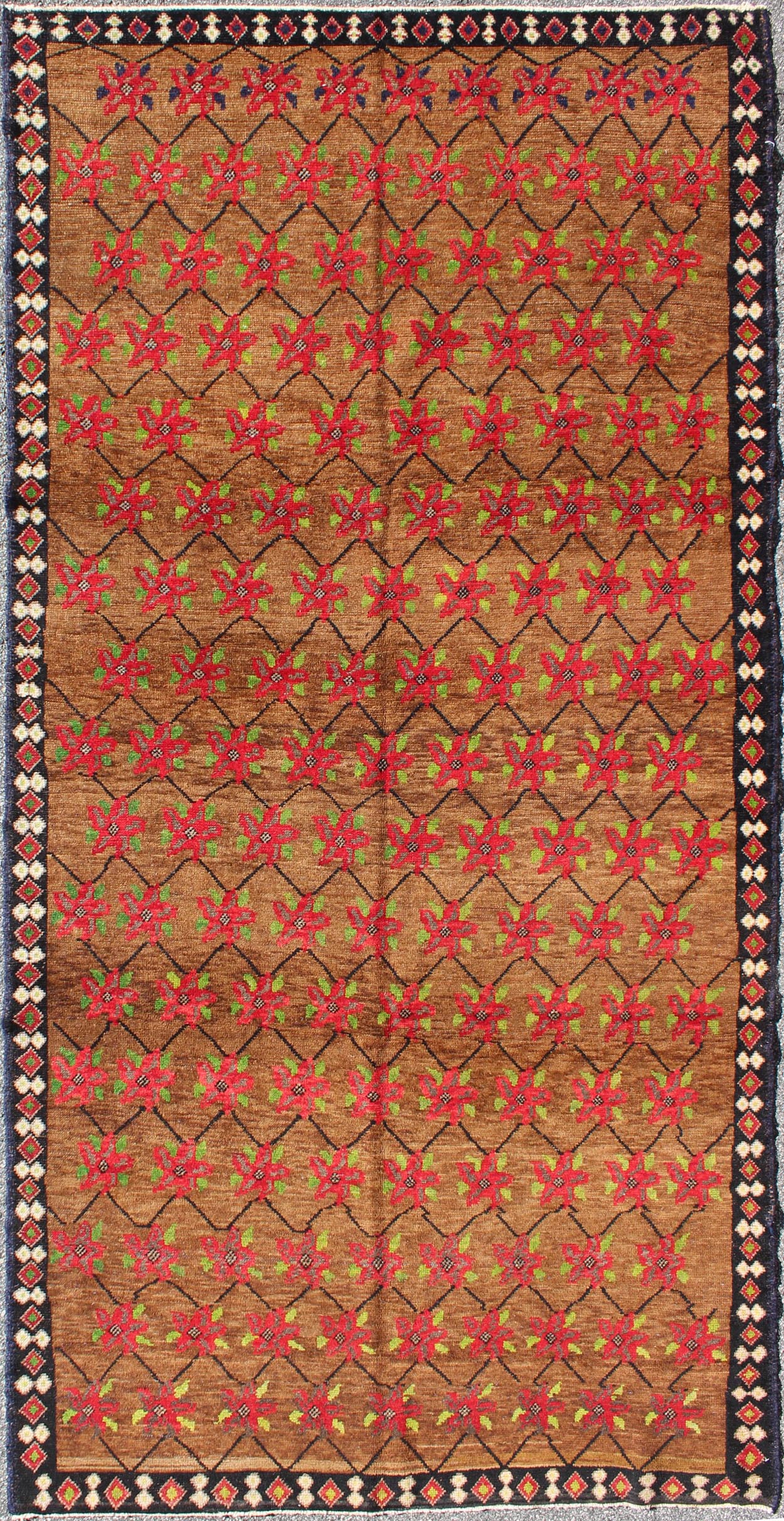 Turkish Oushak Runner with Poinsettia Design Set Atop Light Brown Background
Poinsettia Design Oushak Turkish Rug with Flowers
rug/tu-mtu-3316, origin/turkey
This unique Turkish Oushak features an all-over design of vibrant poinsettias...