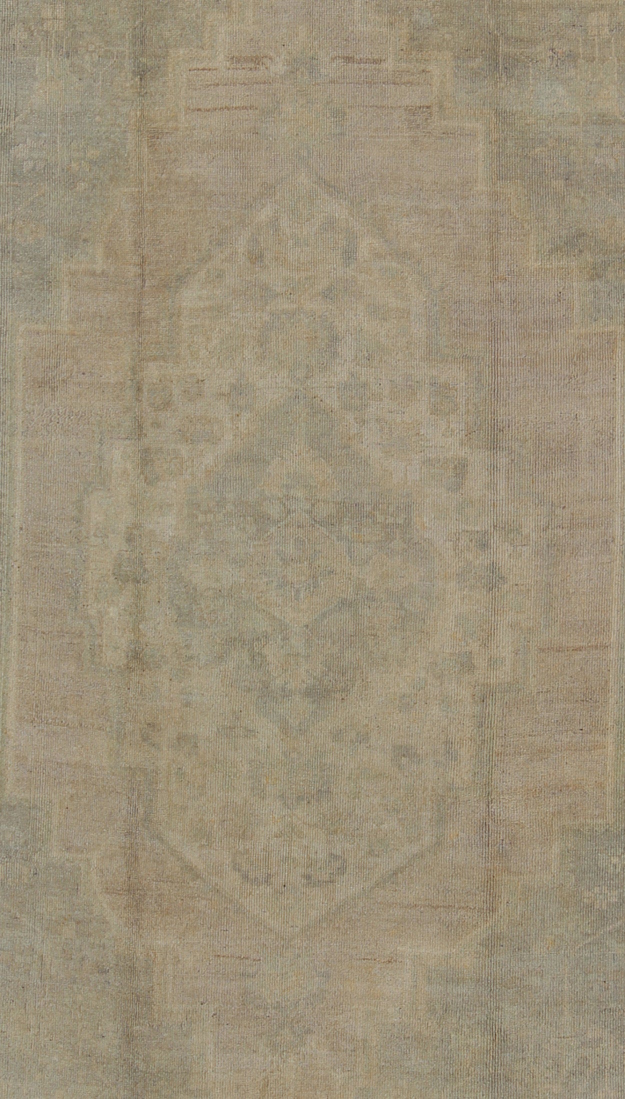 Turkish Oushak Rug with Neutral Color
Characterized by a comely aesthetic and highly representative of light Oushaks, this vintage carpet beautifully integrates neutral compositions to decorate a calm and serene room. This rug features a subtle ...