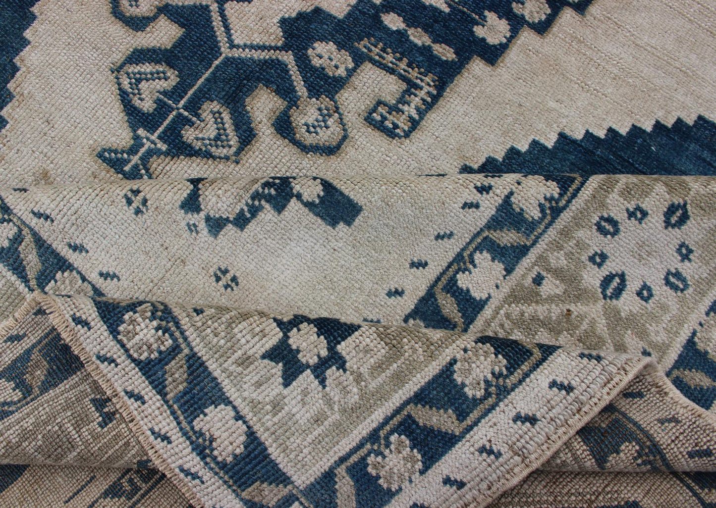 Keivan Woven Arts
Vintage Turkish Oushak Rug with Central Medallion in Blue and Cream
Faded vintage Turkish Oushak rug with Central Medallion in cream and blue, rug tu-mtu-4929, country of origin / type: Turkey / Oushak, circa 1940
...