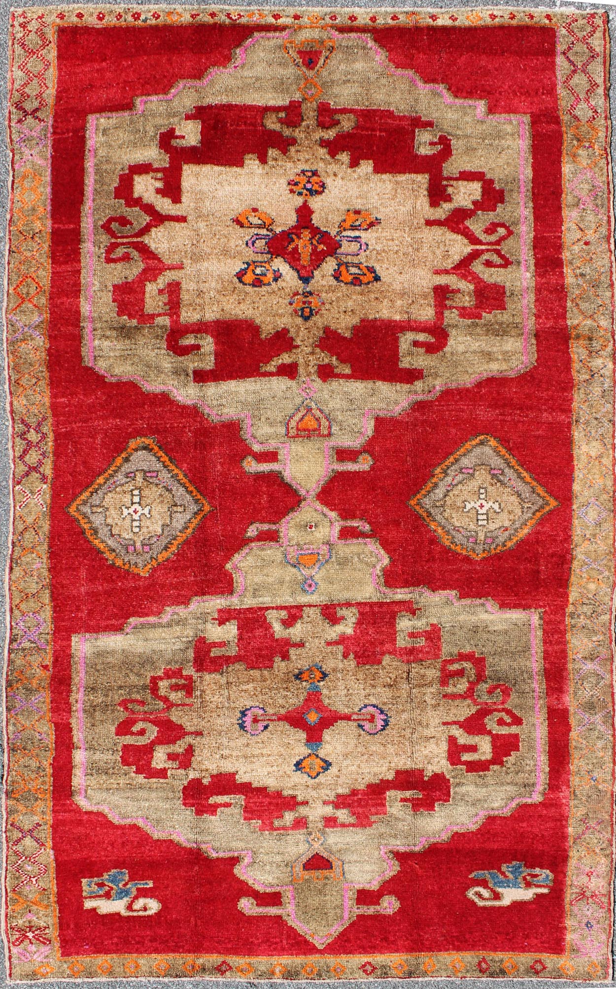 Bright Red and Taupe Vintage Turkish Oushak Rug with Dual Medallion Design
Measures: 5'11'' x 10'4''.
This Turkish rug features a dual central medallion design as well as patterns of smaller Sub-geometric elements in the border. Colors includ...