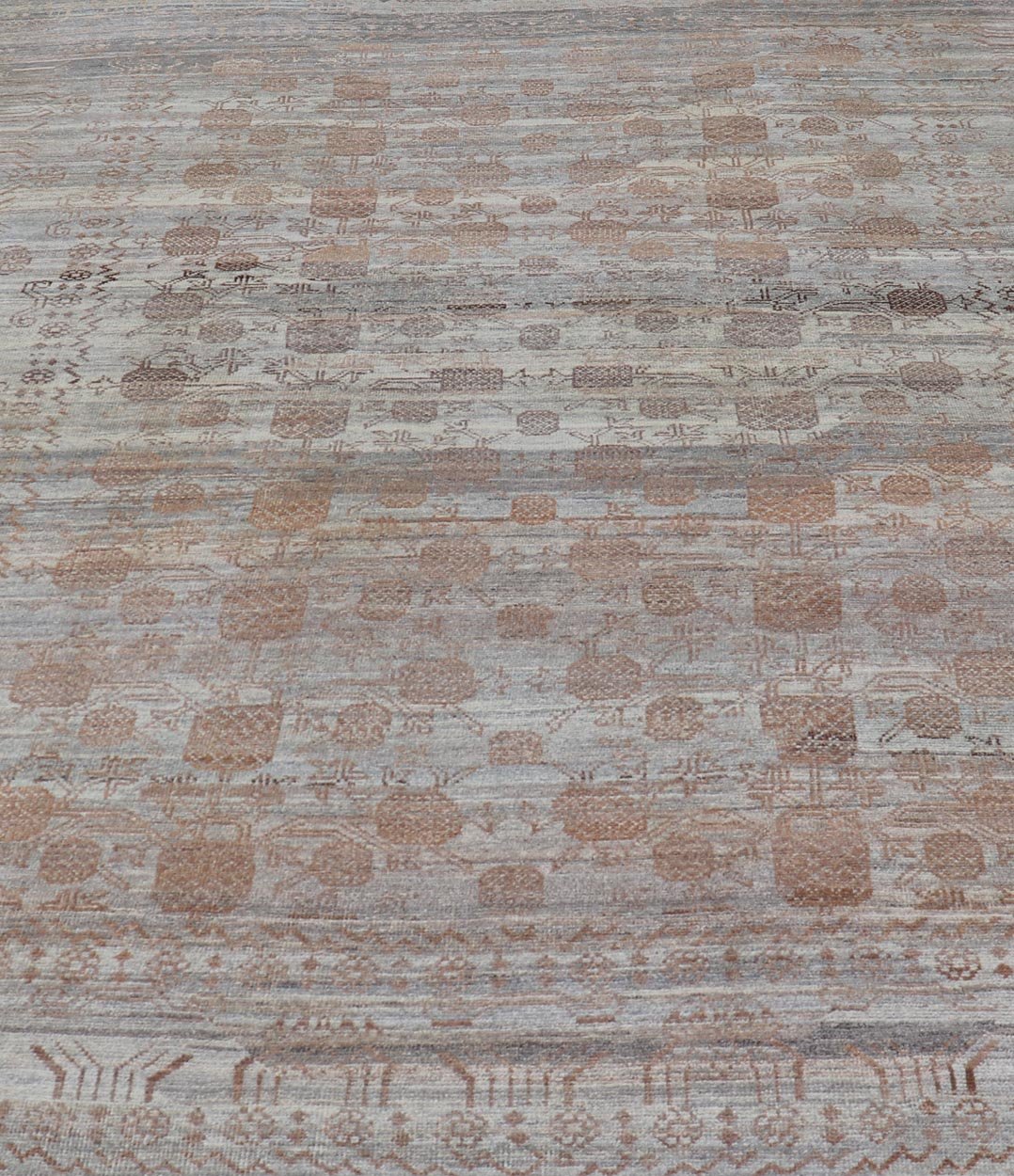 Modern Hand - Knotted Khotan Rug with Sub - Geometric Pomegranate Design This modern casual tribal rug has been hand - knotted. The rug features a modern sub - geometric pomegranate design and is enclosed within a complementary, multi - tiered border, re... - Keivan Woven ArtsAFG - 39680 - 19826Rug