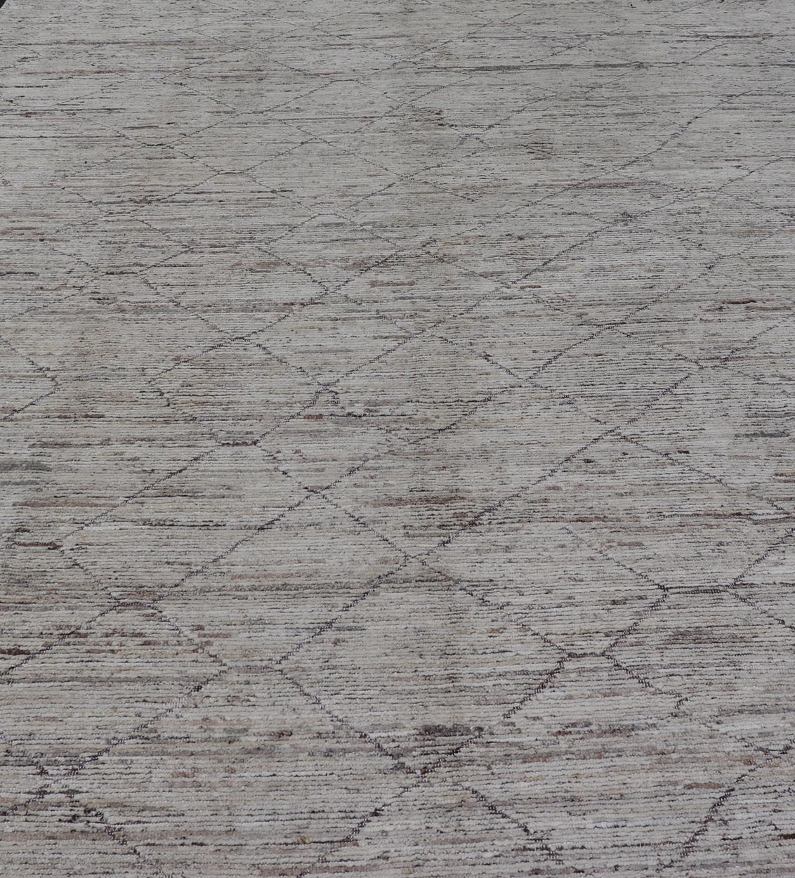 Modern Hand - Knotted Tribal Rug in Wool with Sub - Geometric Diamond Design This modern casual tribal rug has been hand - knotted. The rug features a modern all - over sub - geometric diamond design, rendered in earthy tones, making this rug a superb fi... - Keivan Woven ArtsAFG - 39705 - 19328Rug