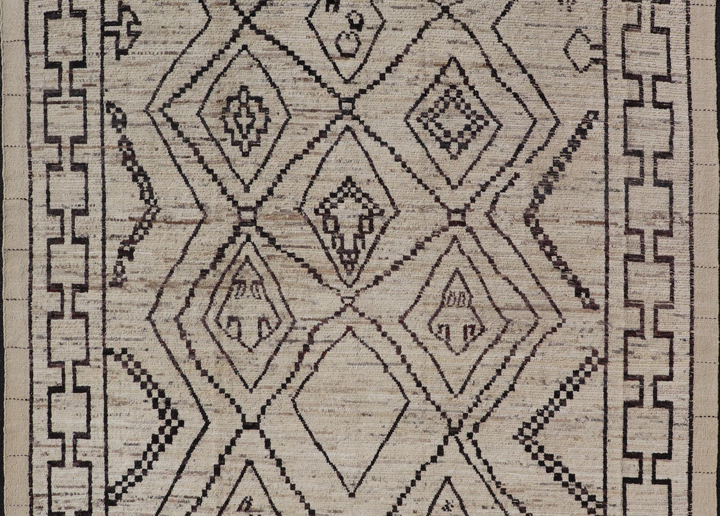 The design of the rug includes a series of interconnected diamond shapes, each containing different motifs such as crosses, zigzags, and other stylized symbols. The central theme is a grid of diamond patterns that vary slightly in size and detail, crea... - Keivan Woven ArtsAFG - 39925 - 19598Rug