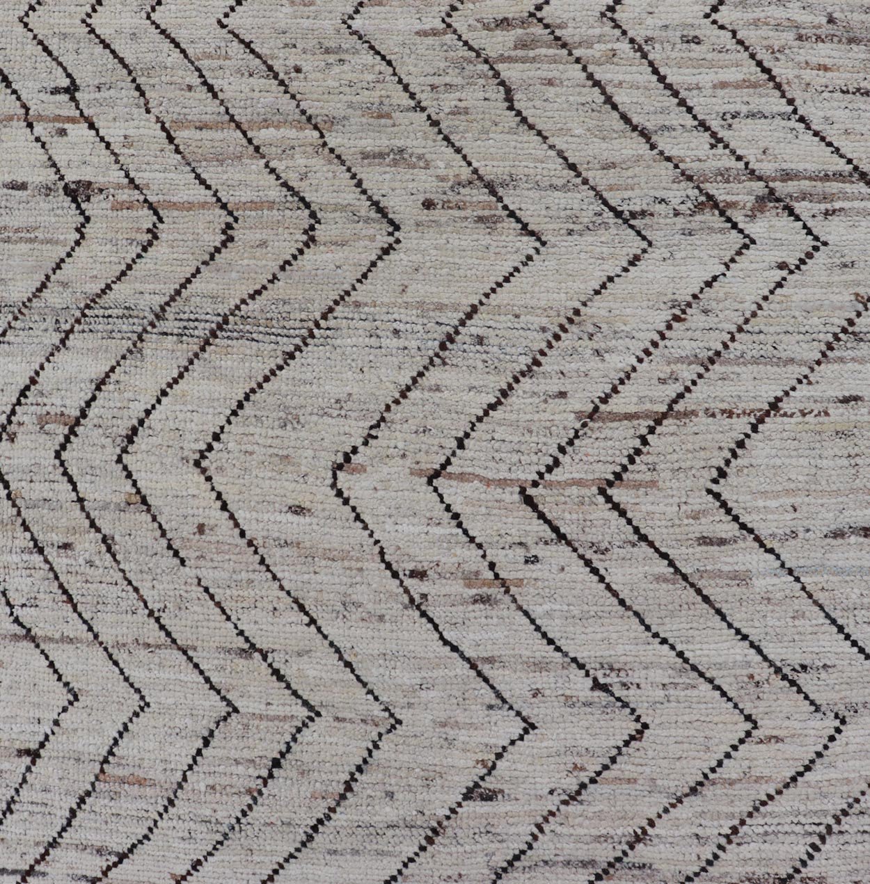 Modern Hand - Knotted Runner in Wool with Sub - Geometric Zig - Zag Design This modern casual runner has been hand - knotted. The rug features a modern sub - geometric zig - zag design, rendered in black and earthy tones, making this rug a superb fit for a... - Keivan Woven ArtsAFG - 39950 - 19238Rug