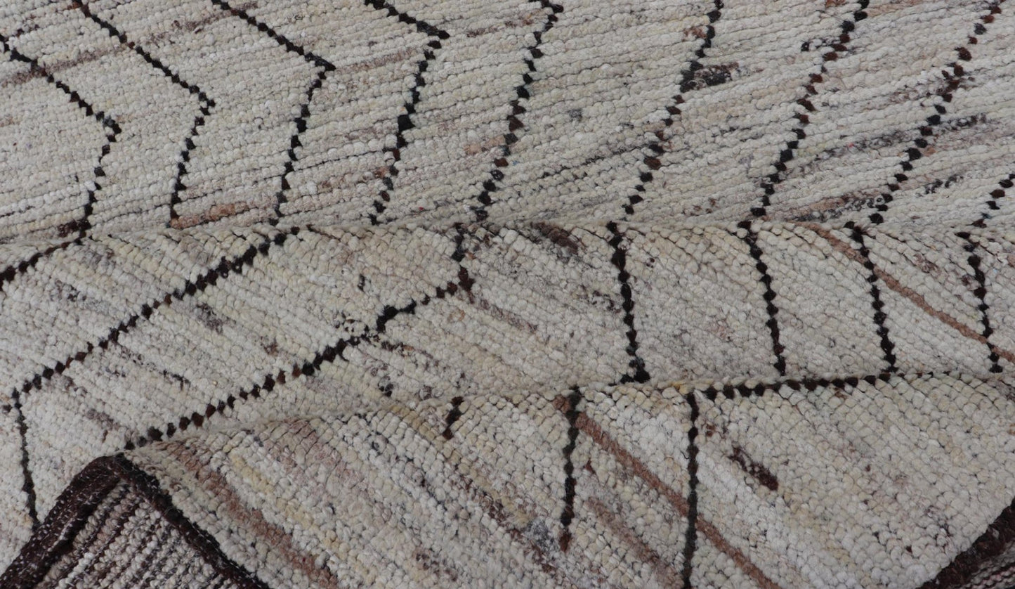 Modern Hand - Knotted Runner in Wool with Sub - Geometric Zig - Zag Design This modern casual runner has been hand - knotted. The rug features a modern sub - geometric zig - zag design, rendered in black and earthy tones, making this rug a superb fit for a... - Keivan Woven ArtsAFG - 39950 - 19238Rug