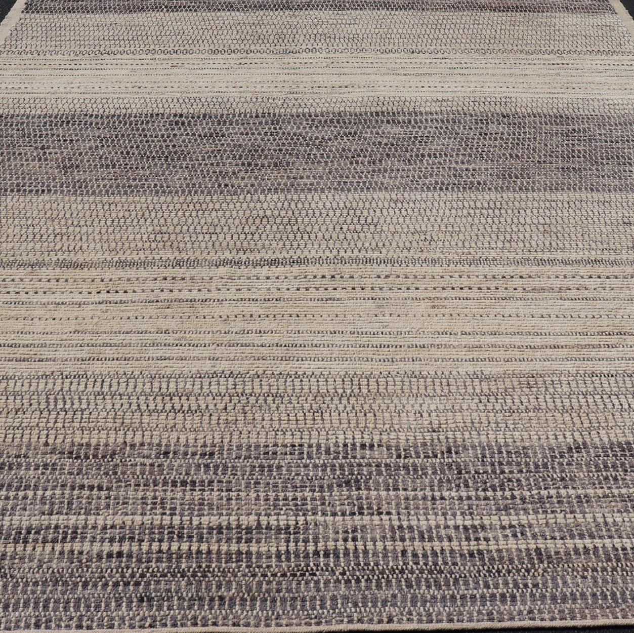 This modern casual tribal rug has been hand - knotted in wool. The rug features an all - over modern sub - geometric horizontal design, rendered in grays, brown, cream and neutral tones. Measures: 9'5 x 12'1. Modern casual tribal rug with sub - geometric... - Keivan Woven ArtsAFG - 40922 - 19622Rug