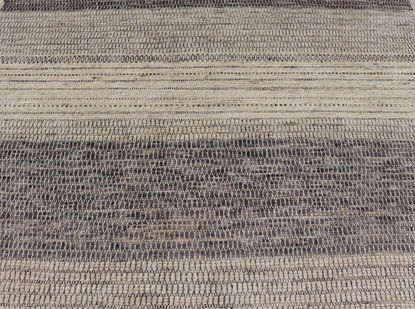 This modern casual tribal rug has been hand - knotted in wool. The rug features an all - over modern sub - geometric horizontal design, rendered in grays, brown, cream and neutral tones. Measures: 9'5 x 12'1. Modern casual tribal rug with sub - geometric... - Keivan Woven ArtsAFG - 40922 - 19622Rug