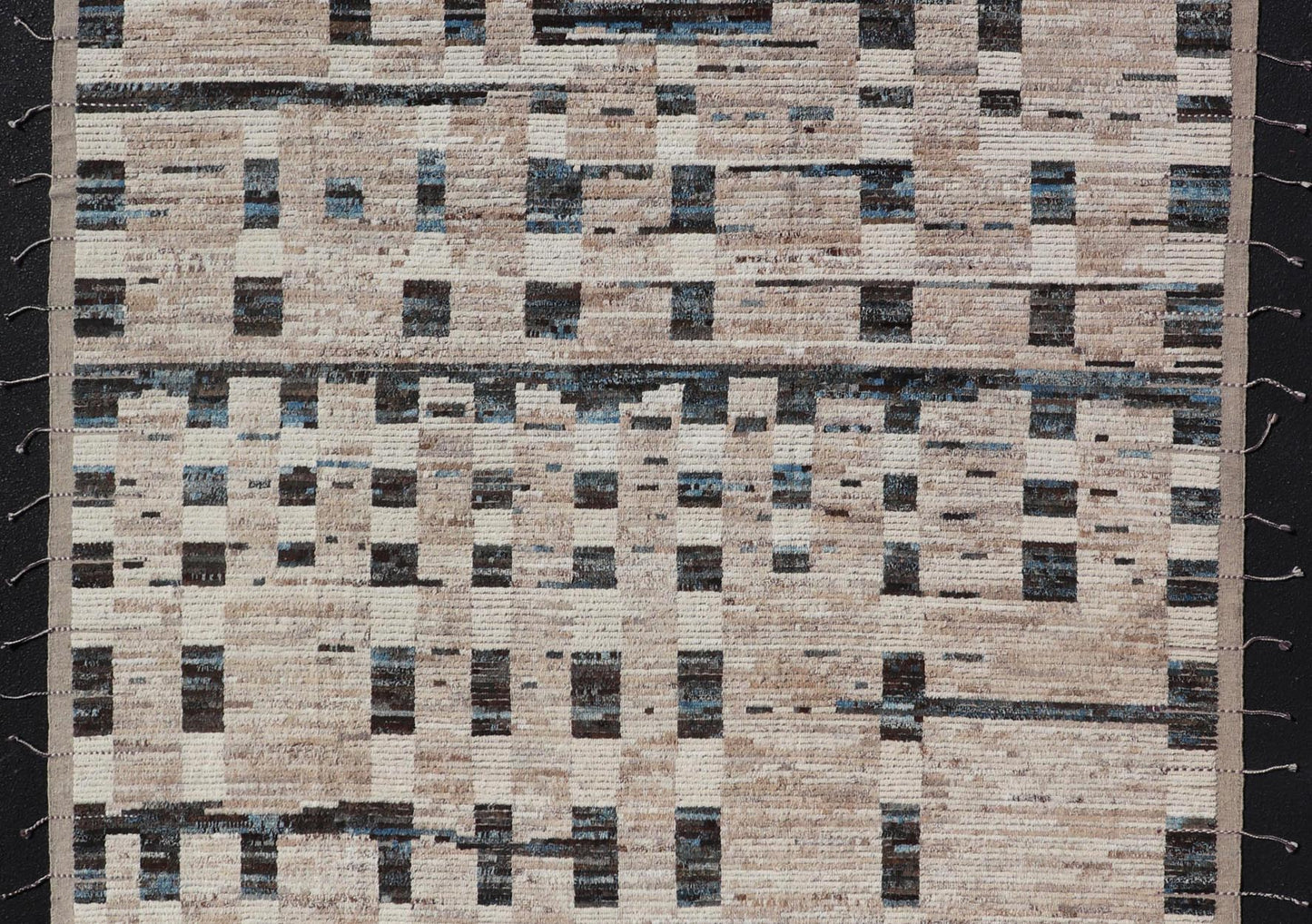 Modern Hand - Knotted Moroccan Rug in Wool with Sub - Geometric Design This modern casual tribal rug has been hand - knotted in wool. The rug features a modern sub - geometric modern design, rendered in blue, charcoal and earthy tones; making this rug a... - Keivan Woven ArtsAFG - 40965 - 19634Rug
