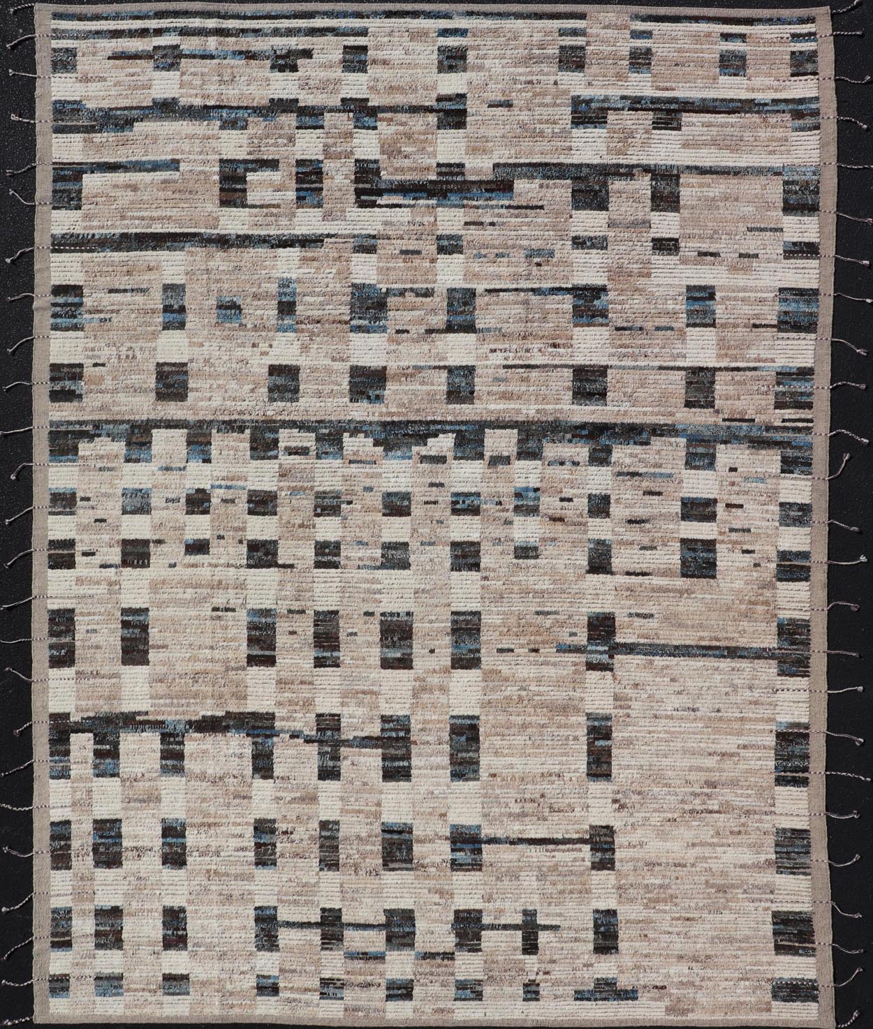 Modern Hand - Knotted Moroccan Rug in Wool with Sub - Geometric Design This modern casual tribal rug has been hand - knotted in wool. The rug features a modern sub - geometric modern design, rendered in blue, charcoal and earthy tones; making this rug a... - Keivan Woven ArtsAFG - 40965 - 19634Rug