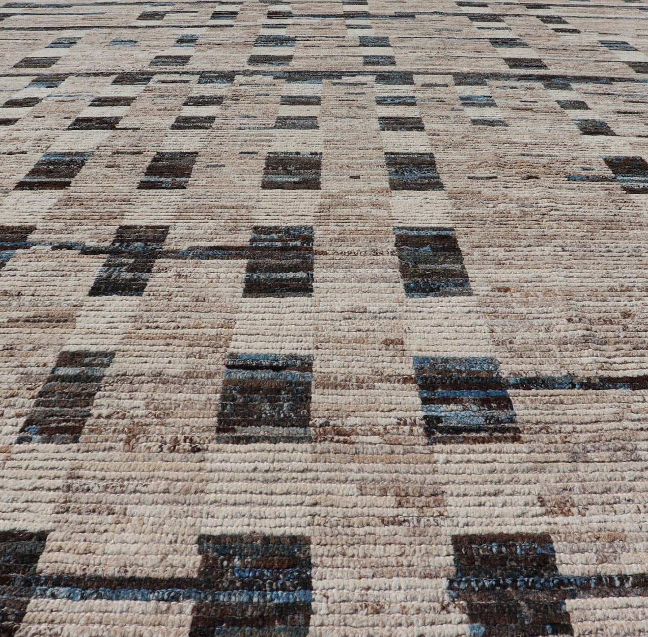 Modern Hand - Knotted Moroccan Rug in Wool with Sub - Geometric Design This modern casual tribal rug has been hand - knotted in wool. The rug features a modern sub - geometric modern design, rendered in blue, charcoal and earthy tones; making this rug a... - Keivan Woven ArtsAFG - 40965 - 19634Rug