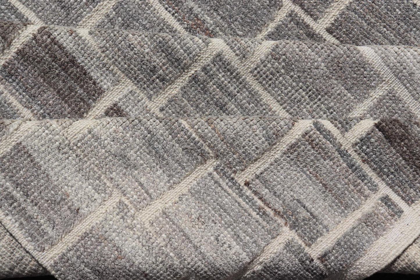 The rug showcases its expansive grid pattern, emphasizing the uniformity and precise alignment of each block. The blocks contrast sharply against the lighter threads, creating a striking visual grid that is both bold and balanced. Perfect for a contemp... - Keivan Woven ArtsAFG - 40986 - 19640Rug