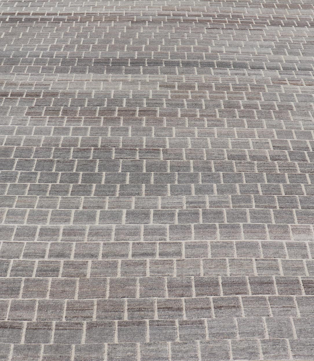 The rug showcases its expansive grid pattern, emphasizing the uniformity and precise alignment of each block. The blocks contrast sharply against the lighter threads, creating a striking visual grid that is both bold and balanced. Perfect for a contemp... - Keivan Woven ArtsAFG - 40986 - 19640Rug