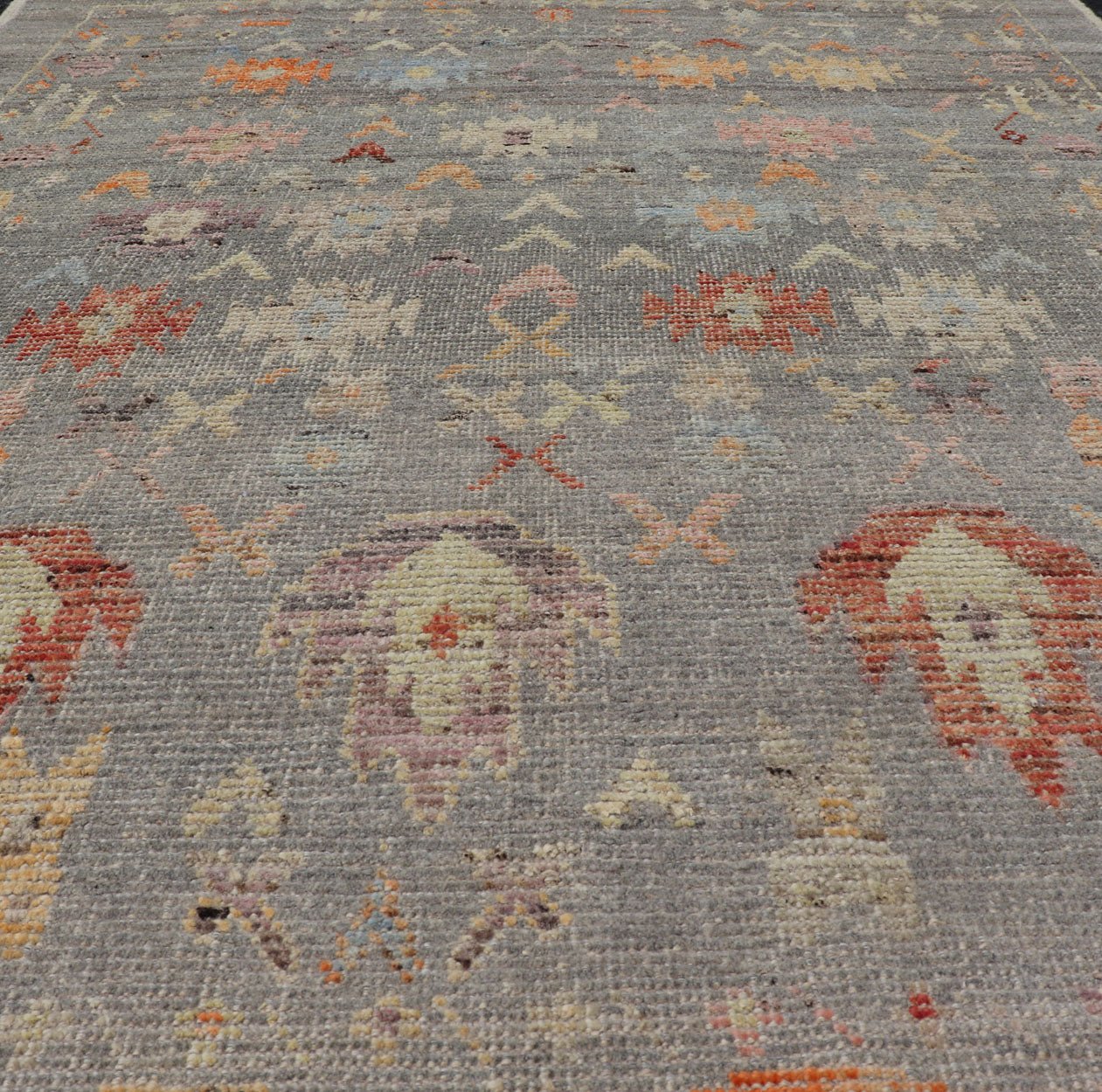 Modern Casual Afghan Hand - Knotted Wool Rug in Taupe Measures: 4'5 x 6'3 This charismatic piece holds much personality in the all - over design of motifs. The tribal - like motifs are rendered in red, beige, pink, blue and small accents of ap... - Keivan Woven ArtsAFG - 43425 - 20253Rug