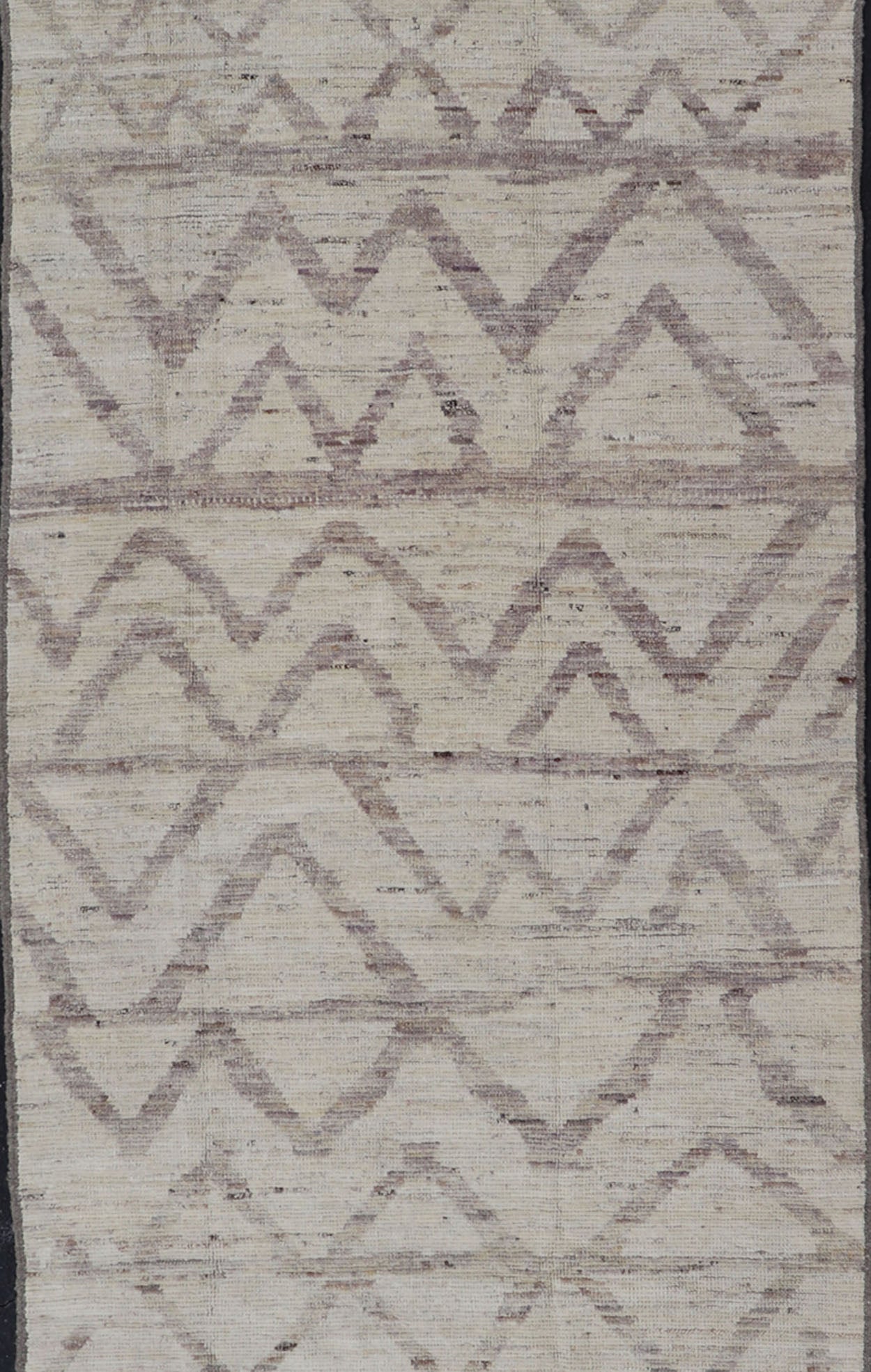 Afghan Modern Casual Chevron Runner in Light Cream and Dark Gray This quirky gallery runner features cream and light gray, with a chevron - like pattern skewing across the rug's width. Between the quiet coalescence of the shades of gray an... - Keivan Woven ArtsAFG - 43428 - 20181Rug