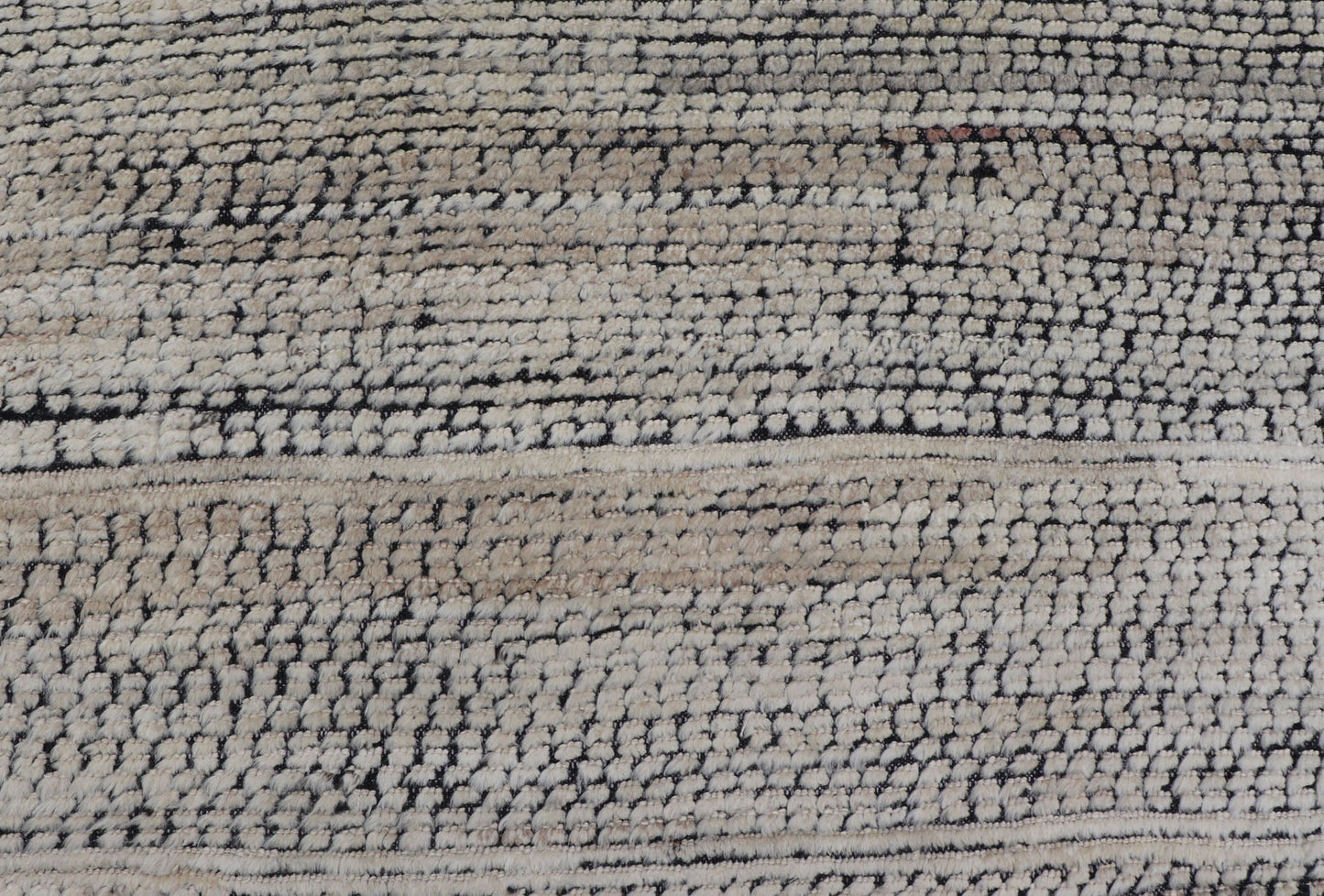 Oversized Afghan Minimalist Modern Casual With Black Background and Ivory Pile This large modern casual rug's field displays a ivory colored pile. Underneath the field shows a black base for a background. These beautiful colors are perfect for ... - Keivan Woven ArtsAFG - 43429 - 20187Rug