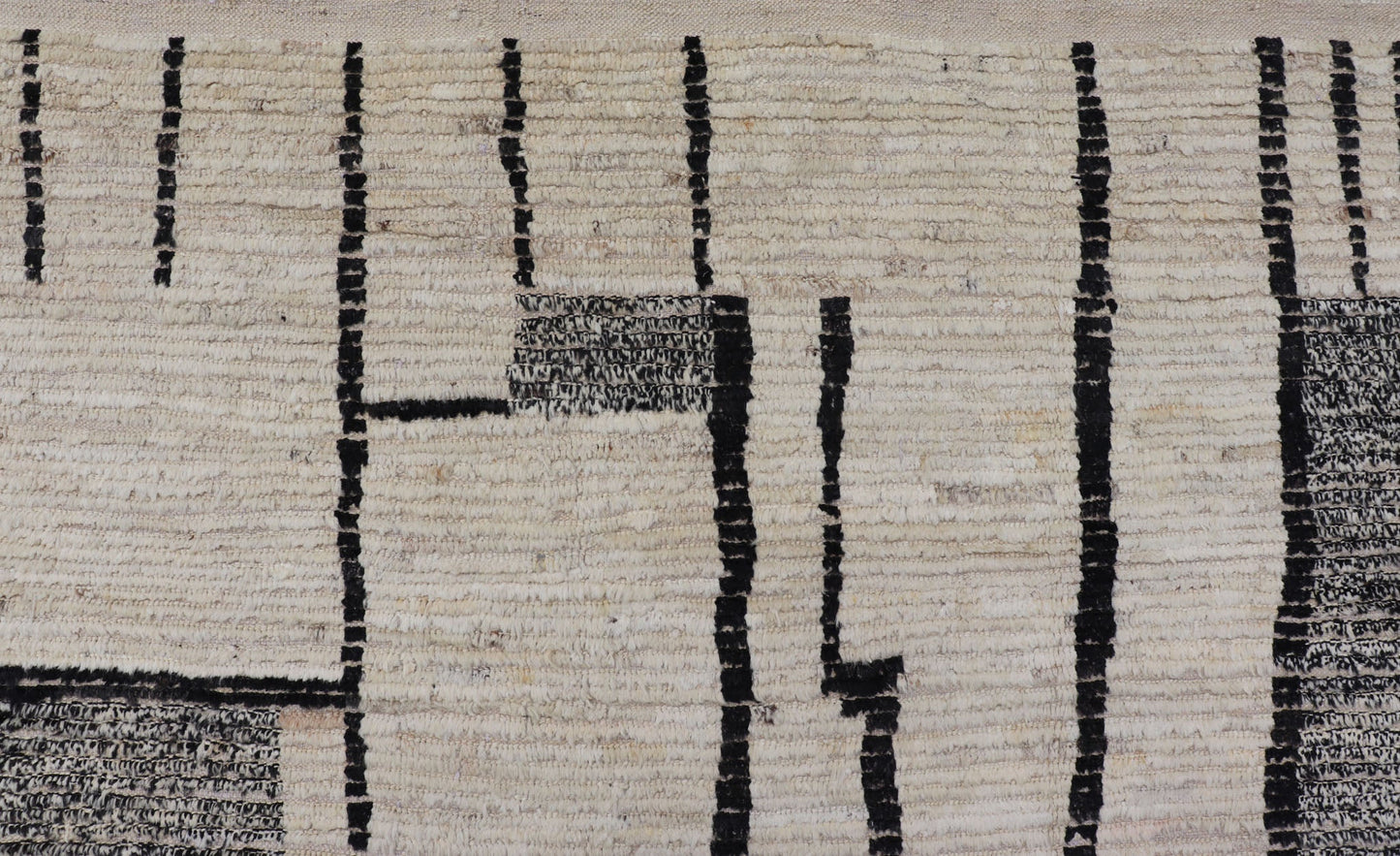 Large Afghan Modern Contemporary Abstract Rug in White and Black This piece has uniqueness in it's abstract design. The background displays a beautiful white color, layered with black abstractions. The black is paired with splashes of g... - Keivan Woven ArtsAFG - 43437 - 20205Rug
