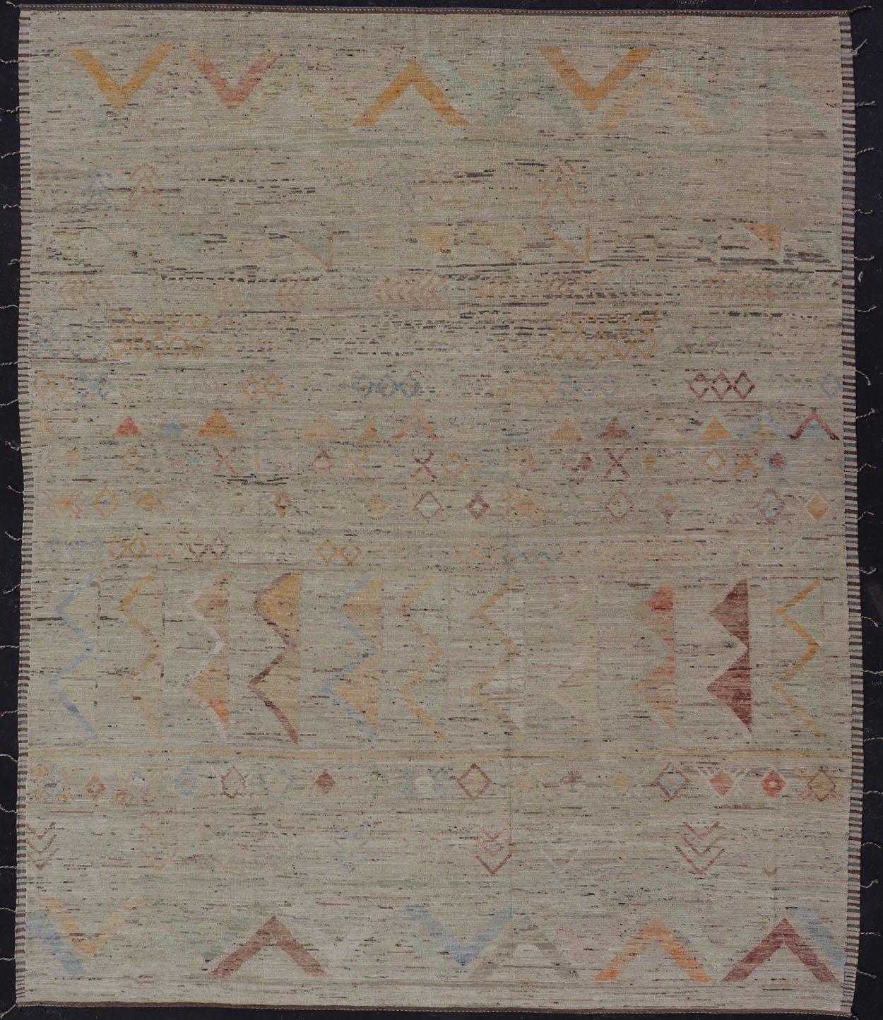 Large Modern Casual Area Rug in Sandy Tones With Pops of Color This elegant modern casual was hand - knotted in Afghanistan. The large open field displays tribal - like motifs atop of warm - yet - subtle sandy hues of beige and light taupe. The des... - Keivan Woven ArtsAFG - 43448 - 20217Rug