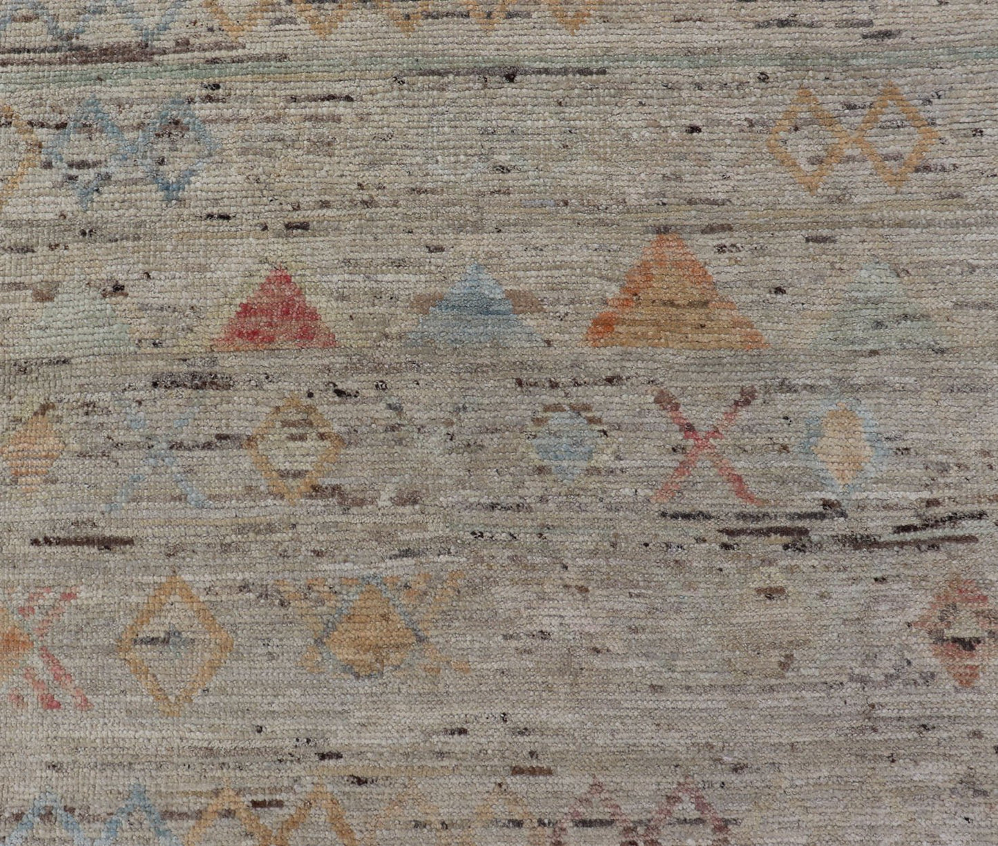 Large Modern Casual Area Rug in Sandy Tones With Pops of Color This elegant modern casual was hand - knotted in Afghanistan. The large open field displays tribal - like motifs atop of warm - yet - subtle sandy hues of beige and light taupe. The des... - Keivan Woven ArtsAFG - 43448 - 20217Rug