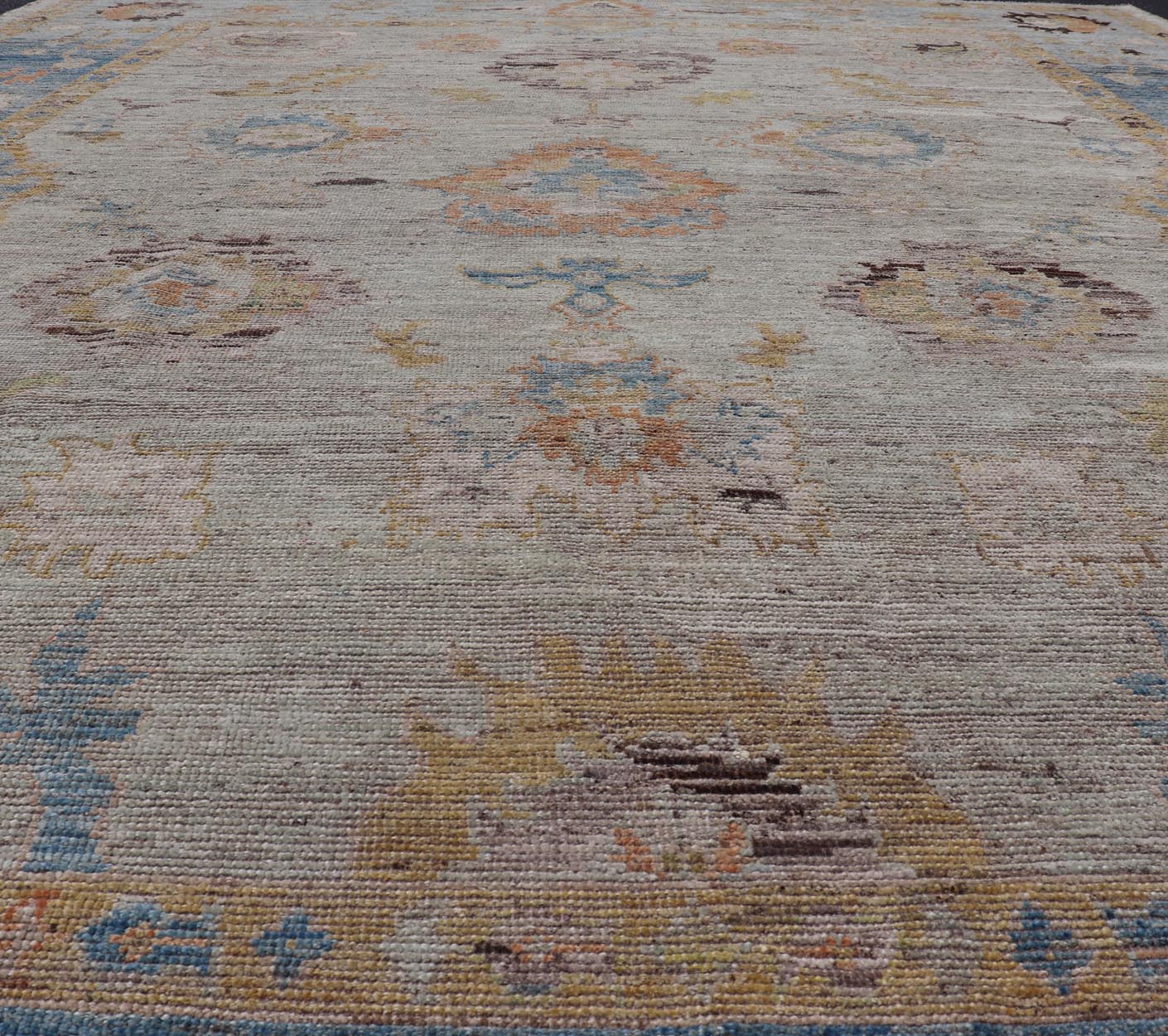 Large Floral Designed Modern Oushak on a Cream Field and Light Blue Border. Keivan Woven Arts rug / AFG - 64120 Country of Origin: Afghanistan Type: Oushak Design: Floral, All - Over, Arabesque - Floral 21st century. Measures: 10'5 x 13'10 Modern Ous... - Keivan Woven ArtsAFG - 64120 - 24806Rug