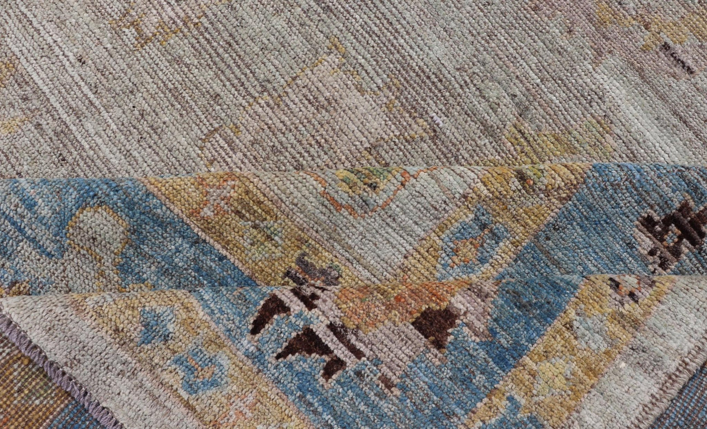 Large Floral Designed Modern Oushak on a Cream Field and Light Blue Border. Keivan Woven Arts rug / AFG - 64120 Country of Origin: Afghanistan Type: Oushak Design: Floral, All - Over, Arabesque - Floral 21st century. Measures: 10'5 x 13'10 Modern Ous... - Keivan Woven ArtsAFG - 64120 - 24806Rug