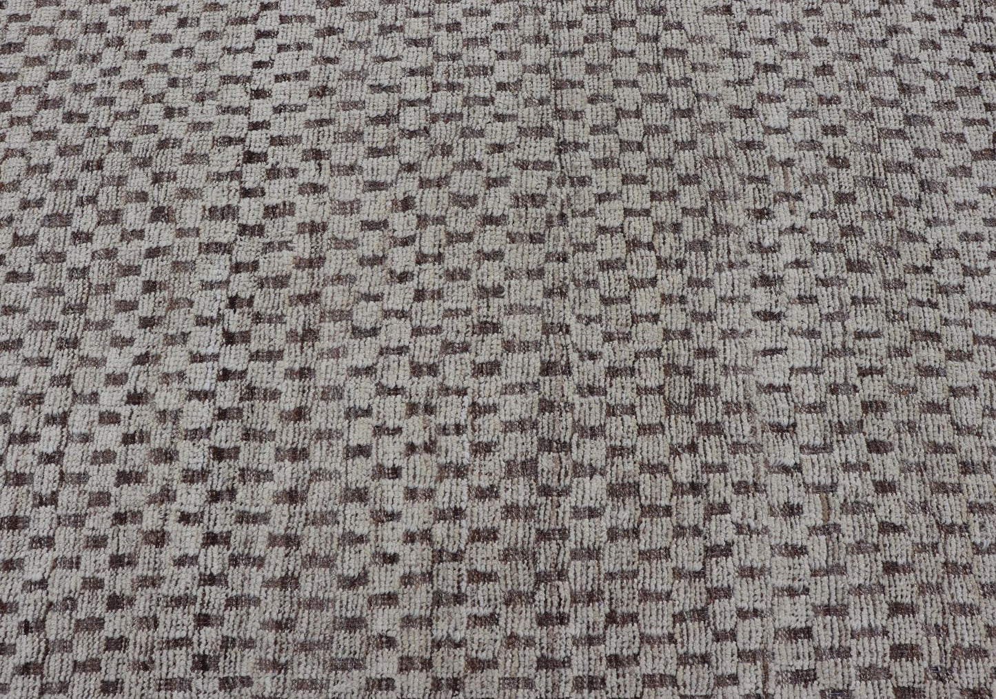 Modern Hand - Knotted Rug in Wool with All - Over Geometric Checkerboard Design This modern casual tribal rug has been hand - knotted. The rug features a modern all - over geometric checkerboard - like design, rendered in brown, cream, taupe, and gray ton... - Keivan Woven ArtsAFGC - 39754 - 19520Rug