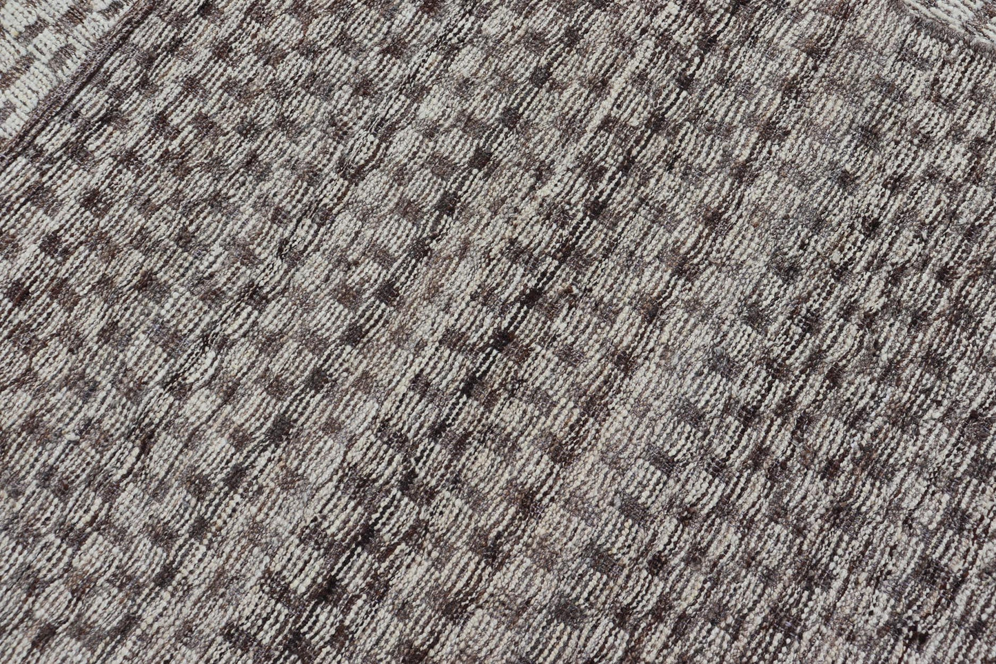 Modern Hand - Knotted Rug in Wool with All - Over Geometric Checkerboard Design This modern casual tribal rug has been hand - knotted. The rug features a modern all - over geometric checkerboard - like design, rendered in brown, cream, taupe, and gray ton... - Keivan Woven ArtsAFGC - 39754 - 19520Rug