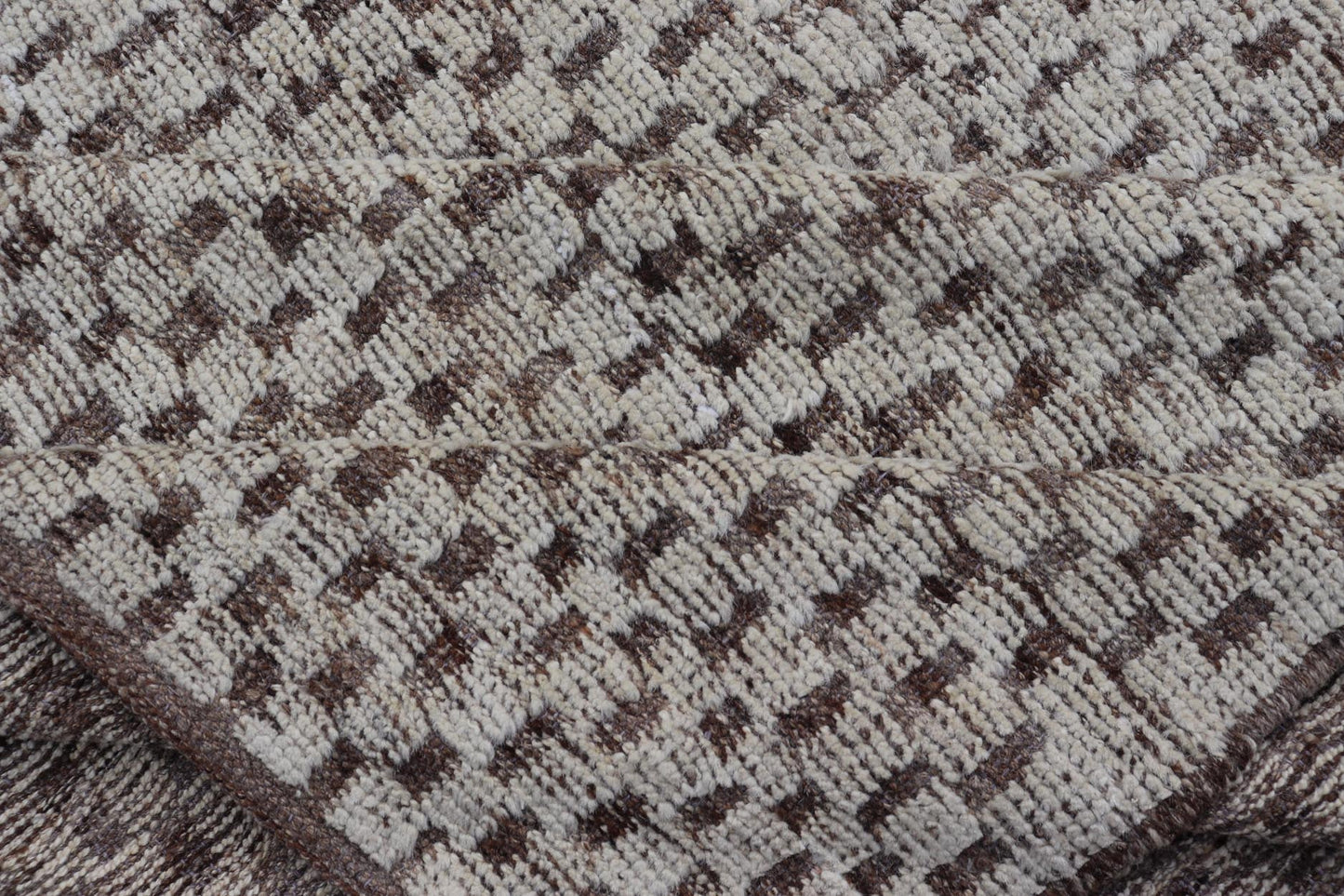 Modern Hand - Knotted Rug in Wool with All - Over Geometric Checkerboard Design This modern casual tribal rug has been hand - knotted. The rug features a modern all - over geometric checkerboard - like design, rendered in brown, cream, taupe, and gray ton... - Keivan Woven ArtsAFGC - 39754 - 19520Rug