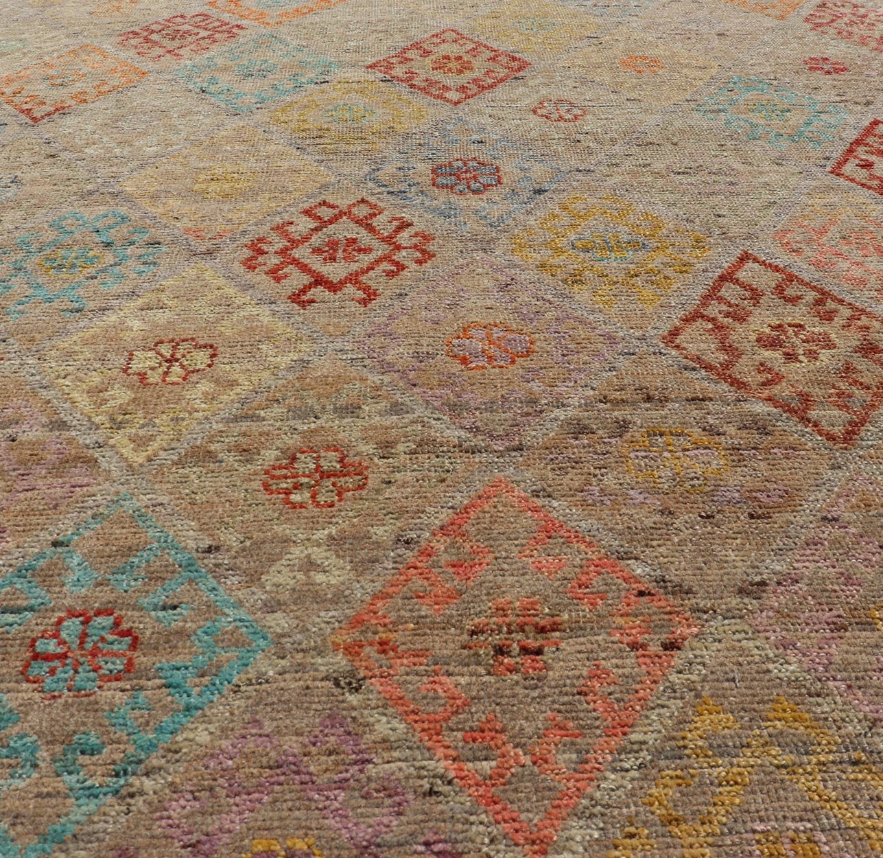 Modern Hand - Knotted Tribal Rug in Wool with Sub - Geometric Diamond Design This modern casual tribal rug has been hand - knotted. The rug features a modern sub - geometric diamond design rendered in multicolor; making this rug a superb fit for a vari... - Keivan Woven ArtsAFGC - 39941 - 19388Rug