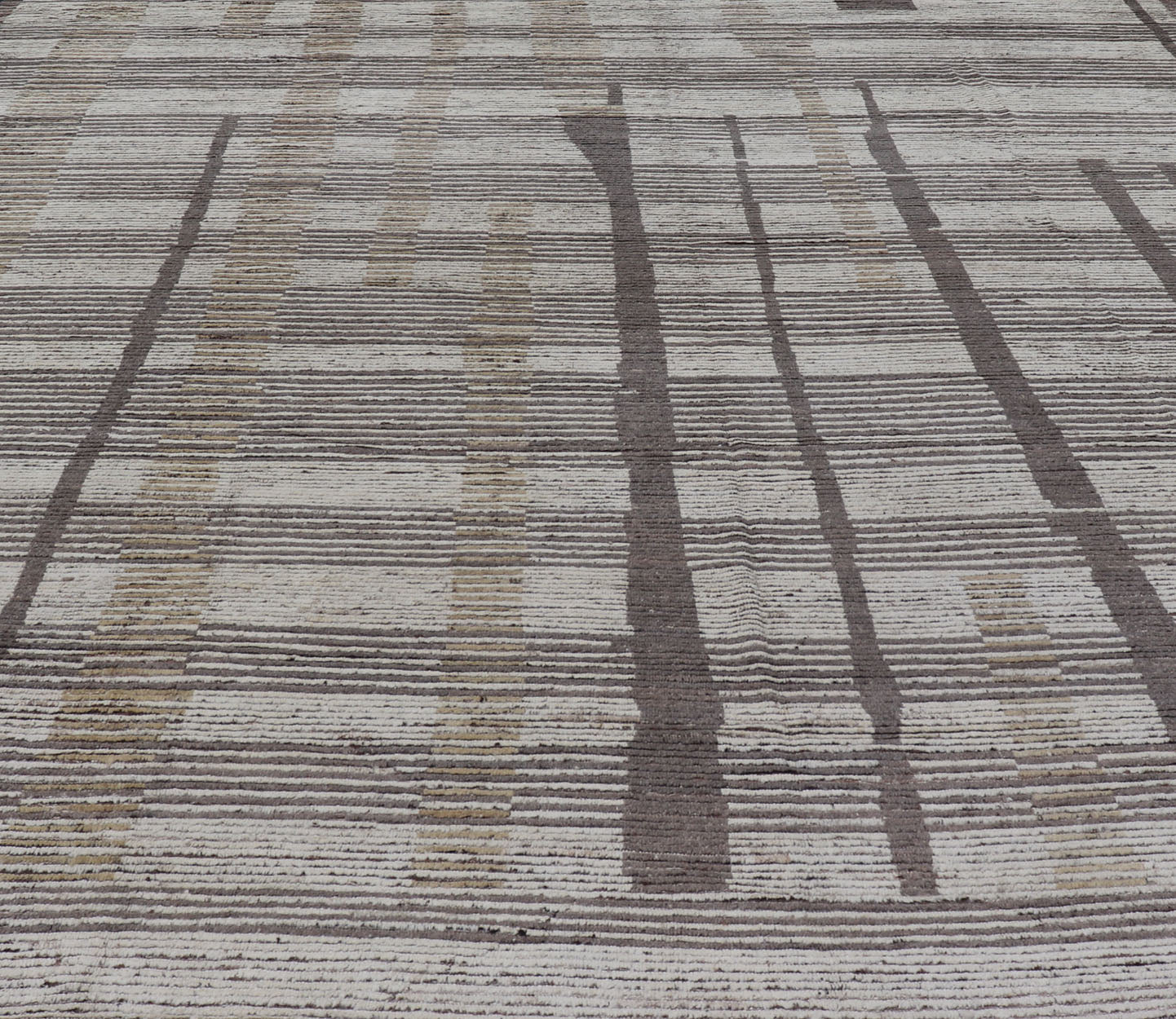 Oversized Afghan Modern Casual Abstract Rug in Muted Earthy Tones This large modern casual features earthy tones, starting with a homogeneous ivory background, with panes of horizontal stripes of taupe. The field features an abstract fo... - Keivan Woven ArtsAFGC - 43431 - 20163Rug