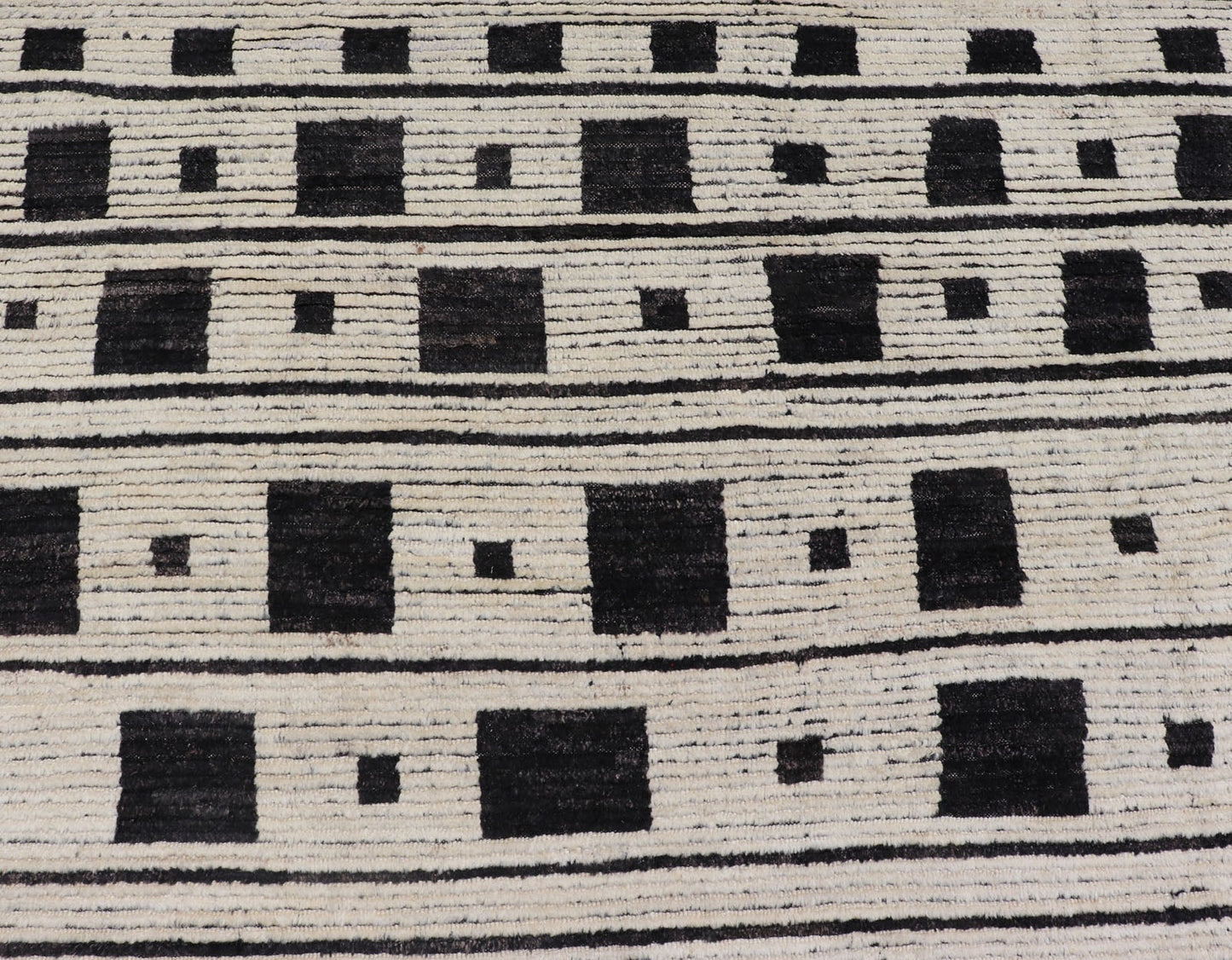 Palace Size Afghan Modern Casual Hand - Knotted in Wool With Black and White This oversized modern casual displays sub - geometric patterns on the top and bottom of the field, stacked above and below striped and boxed abstractions. The timeless ... - Keivan Woven ArtsAFGC - 43440 - 20151Rug