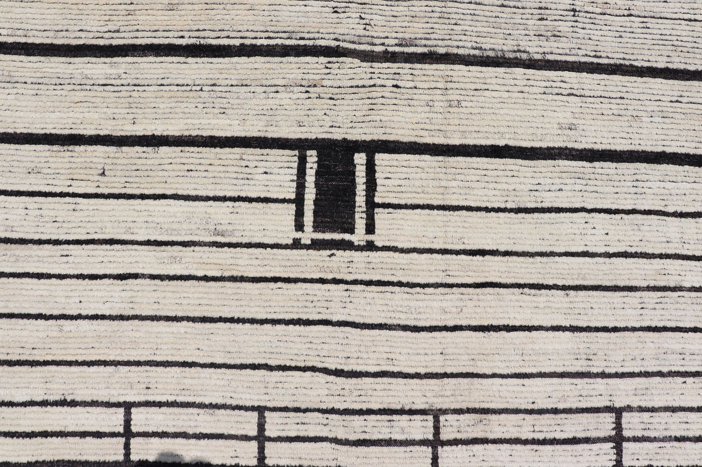 Palace Size Afghan Modern Casual Hand - Knotted in Wool With Black and White This oversized modern casual displays sub - geometric patterns on the top and bottom of the field, stacked above and below striped and boxed abstractions. The timeless ... - Keivan Woven ArtsAFGC - 43440 - 20151Rug