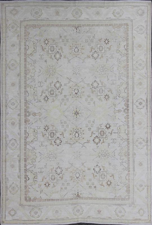 This Afghan made fine rug rug features a transitional design of stylized motifs in the central field, which are flanked by a repeating pattern in the border. The entirety of the piece is rendered in light tones, which makes it a versatile rug, well - sui... - Keivan Woven ArtsAIA - 151 - 6422
