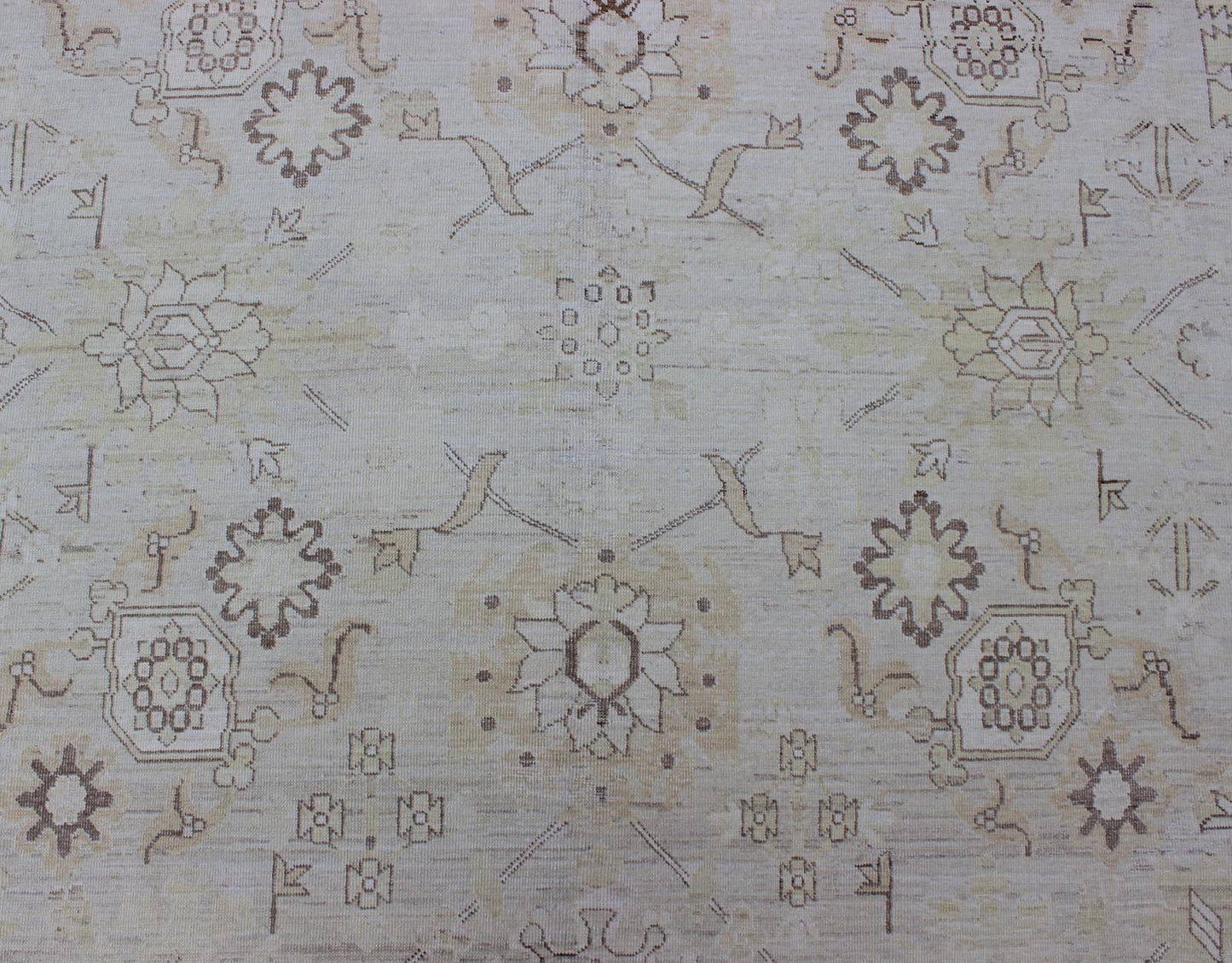 This Afghan made fine rug rug features a transitional design of stylized motifs in the central field, which are flanked by a repeating pattern in the border. The entirety of the piece is rendered in light tones, which makes it a versatile rug, well - sui... - Keivan Woven ArtsAIA - 151 - 6422Rug
