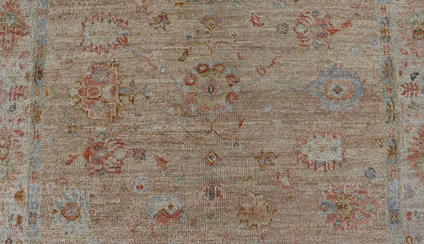 Turkish Oushak Floral Design with Color on A Taupe Field and Ivory Border This hand - knotted Oushak has a sub - floral Oushak design that spreads on the the field, rendered in coral, salmon, light blue, gold, and green. The background of the field... - Keivan Woven ArtsAN - 149322 - 19923Rug
