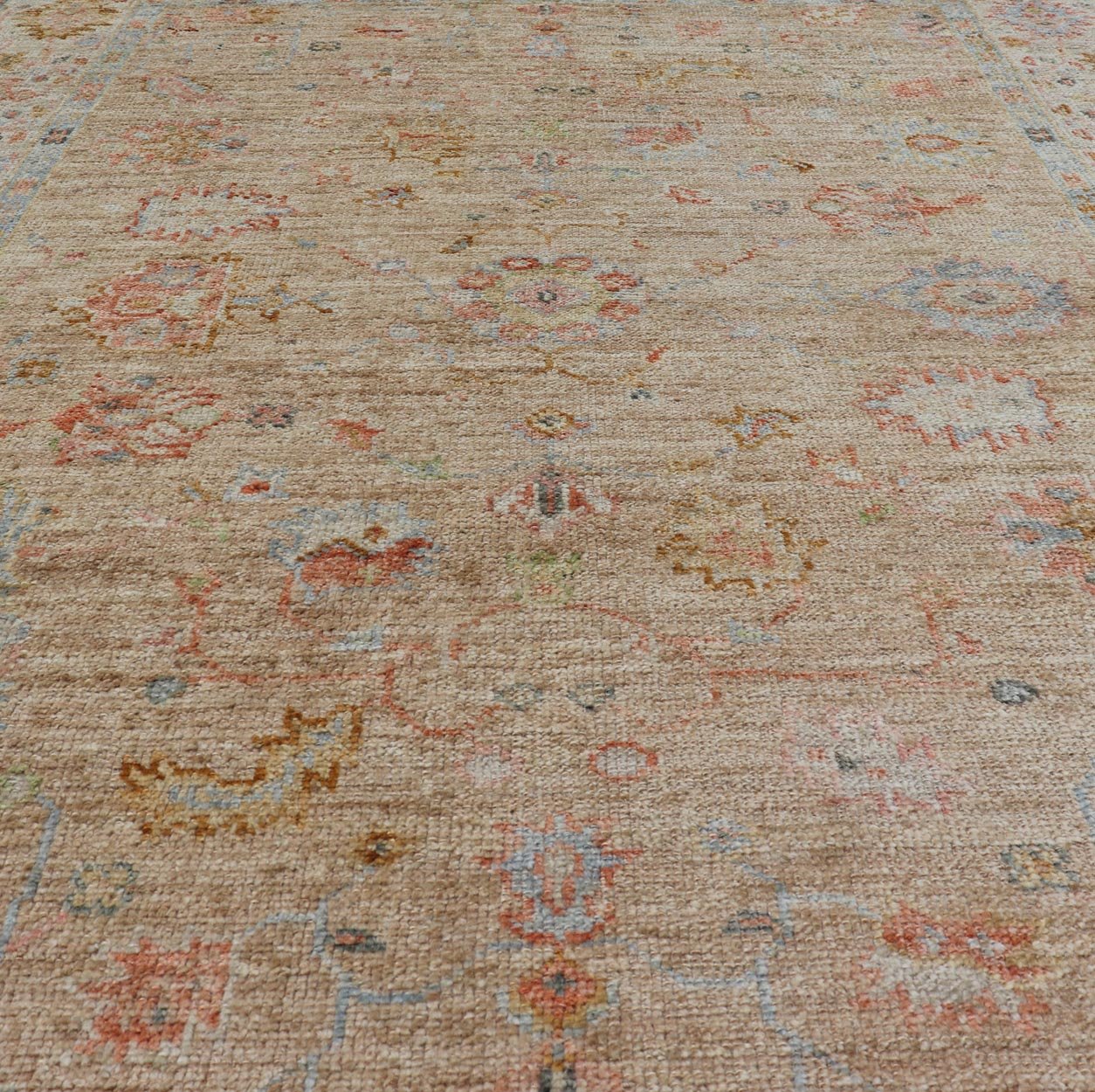 Turkish Oushak Floral Design with Color on A Taupe Field and Ivory Border This hand - knotted Oushak has a sub - floral Oushak design that spreads on the the field, rendered in coral, salmon, light blue, gold, and green. The background of the field... - Keivan Woven ArtsAN - 149322 - 19923Rug